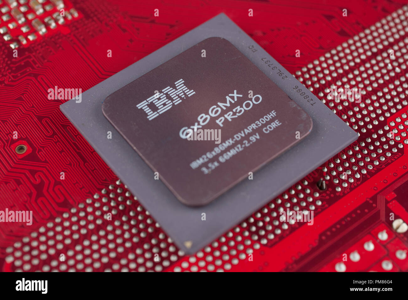 KYIV, UKRAINE - July 28, 2018. IBM 686MX PR300 processor on red circuit board. Stock Photo