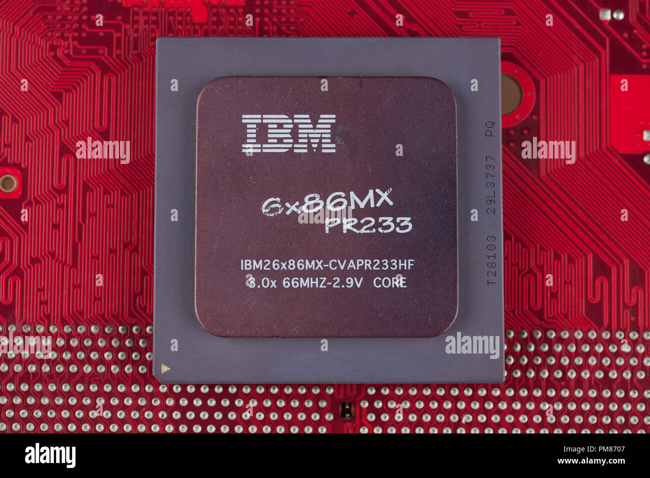 KYIV, UKRAINE - July 28, 2018. IBM 686MX PR233 processor on red circuit board. Stock Photo
