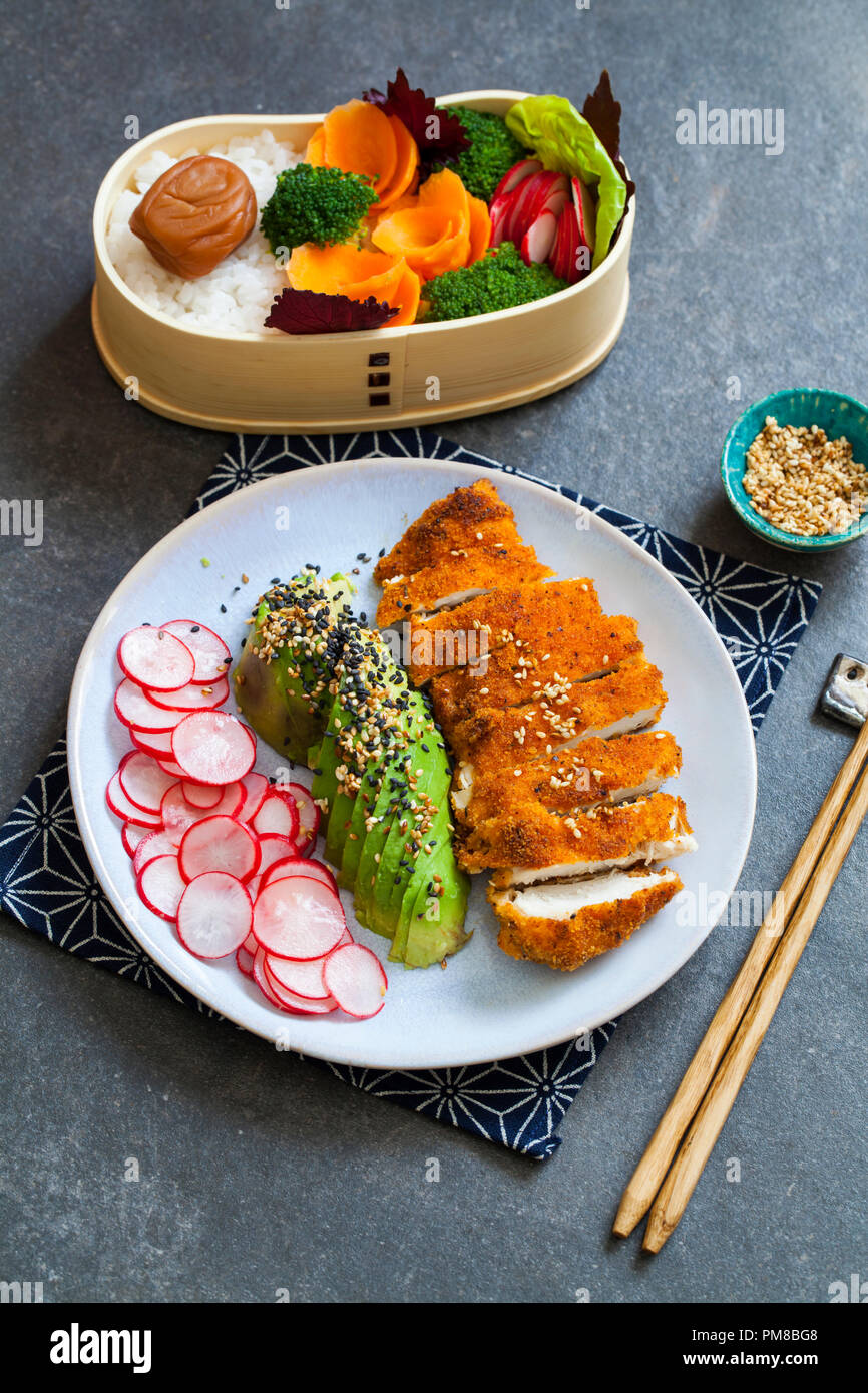 Japanese style lunch with crispy chicken and avocado Stock Photo Alamy