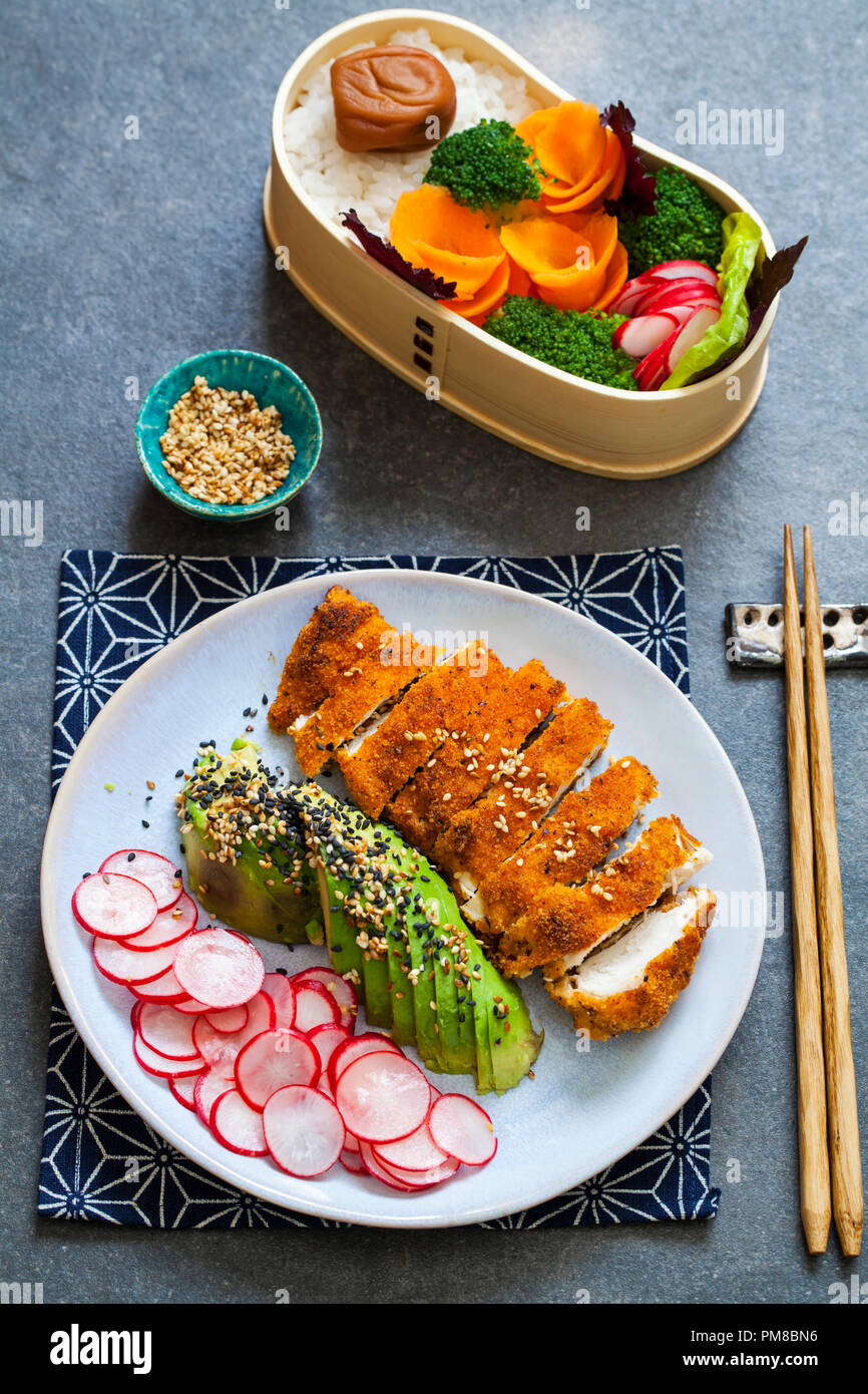 Japanese style lunch with crispy chicken and avocado Stock Photo Alamy