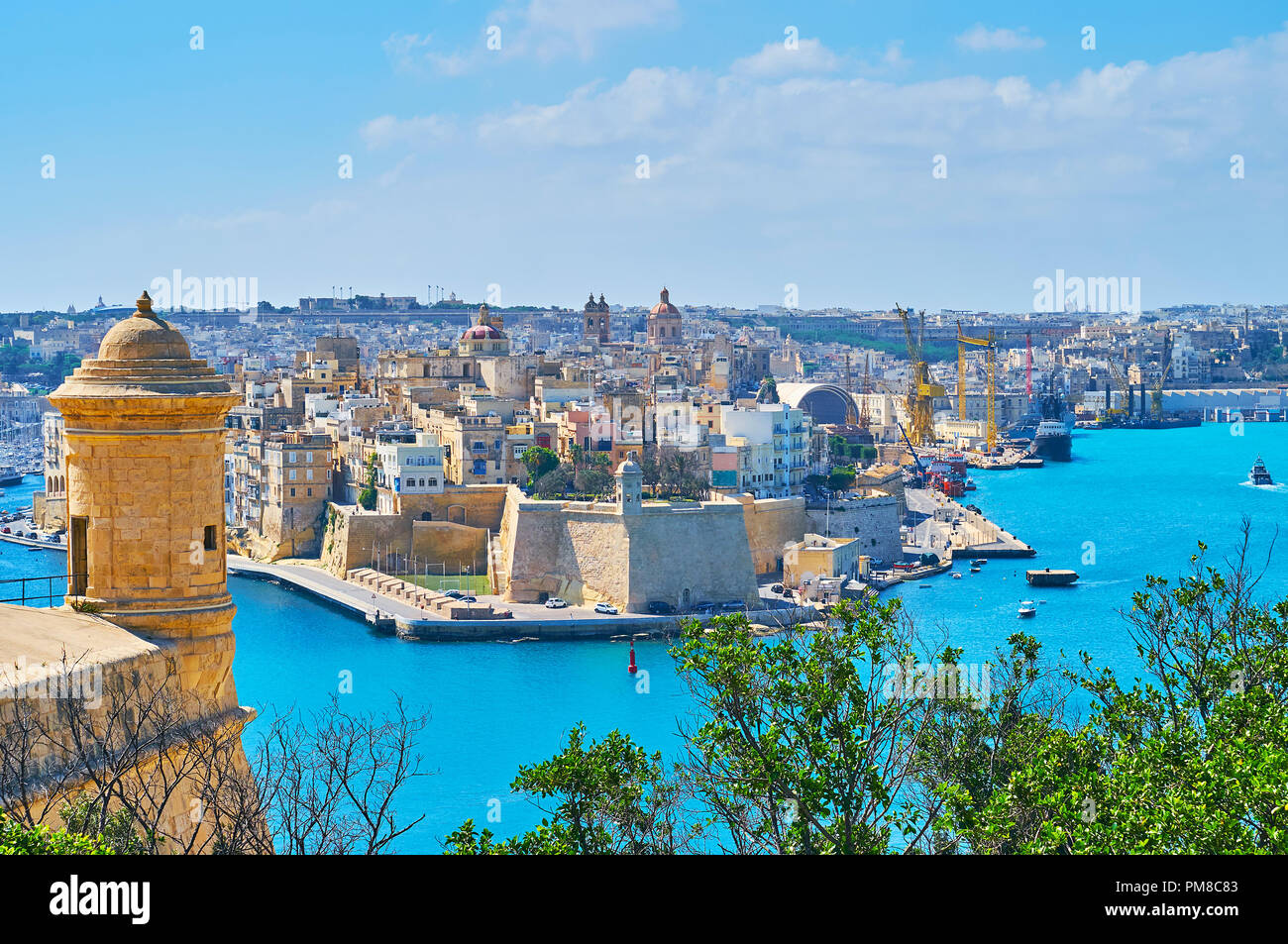 The Grand Harbour of Valletta surrounded by massive medieval forts with bastions, watchtowers and counterguards, such as Senglea or Valletta forts, fa Stock Photo
