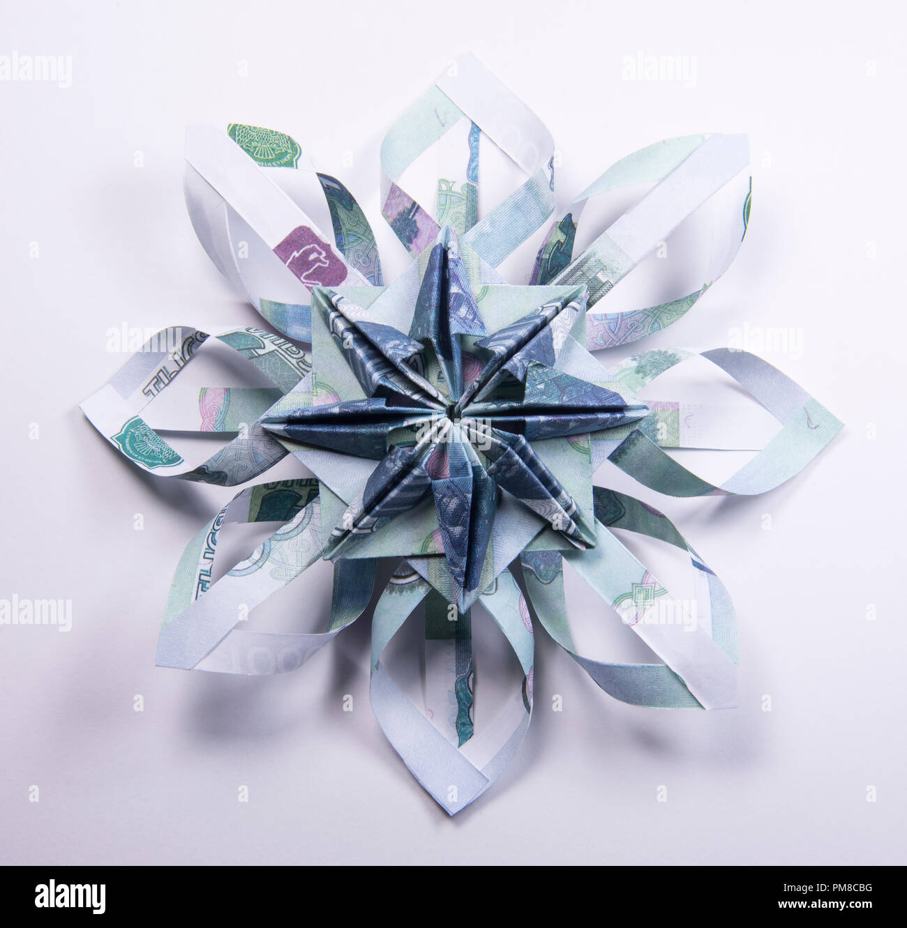 Money Origami snowflake Stock Photo - Alamy