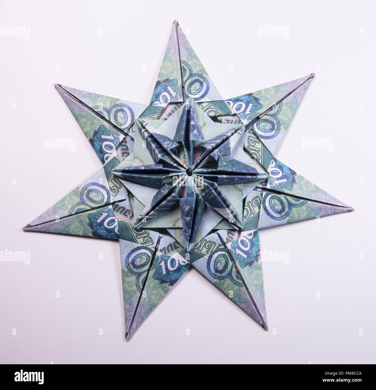 Money Origami snowflake Stock Photo - Alamy