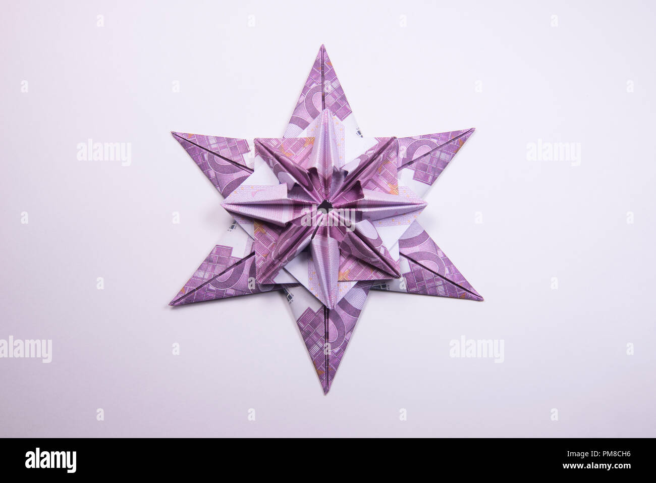 Money Origami snowflake Stock Photo - Alamy