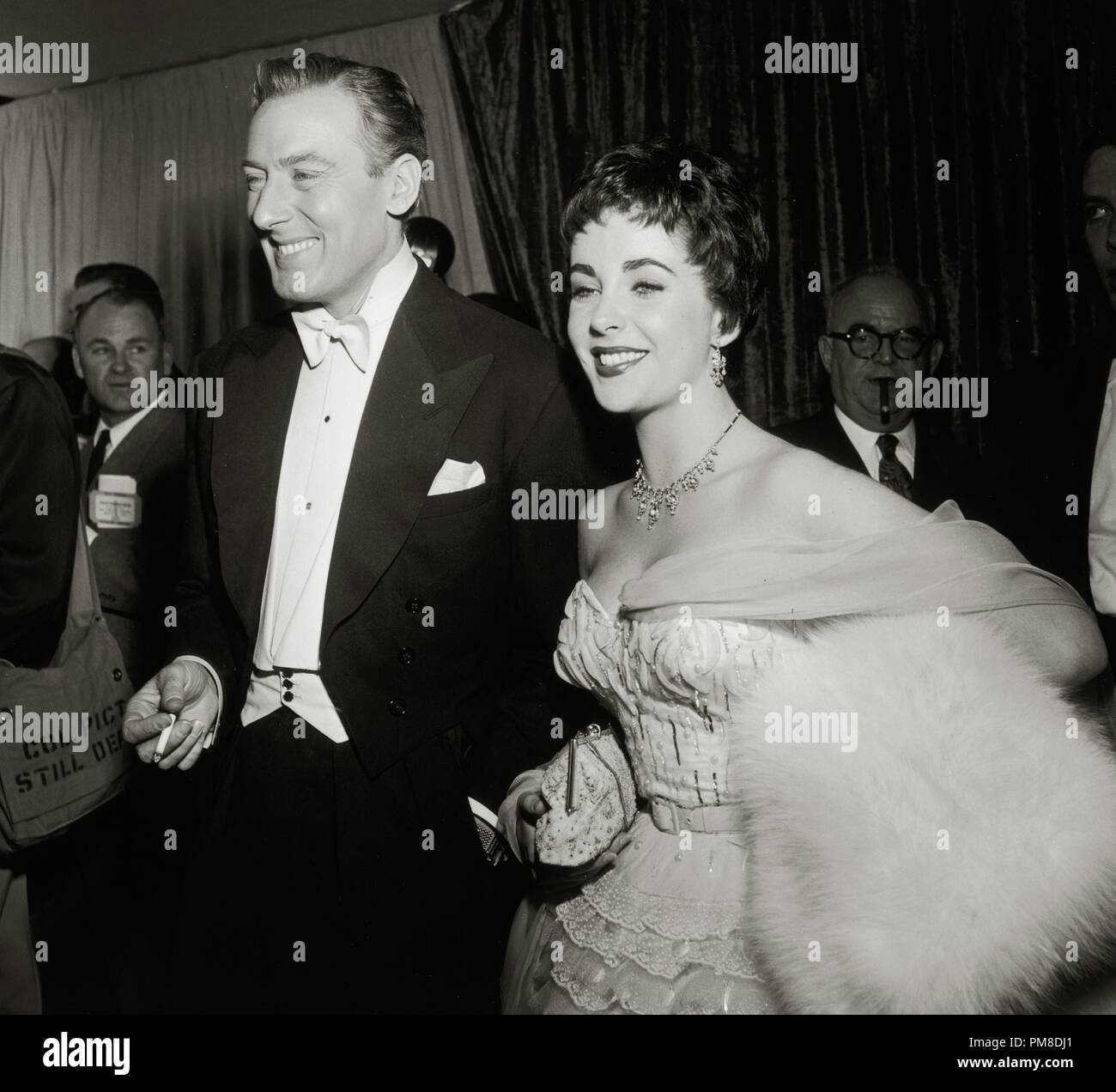 Elizabeth Taylor with her second husband, British actor Michael Wilding at the 26th Annual Academy Awards, 1954 File Reference # 31955 603THA Stock Photo