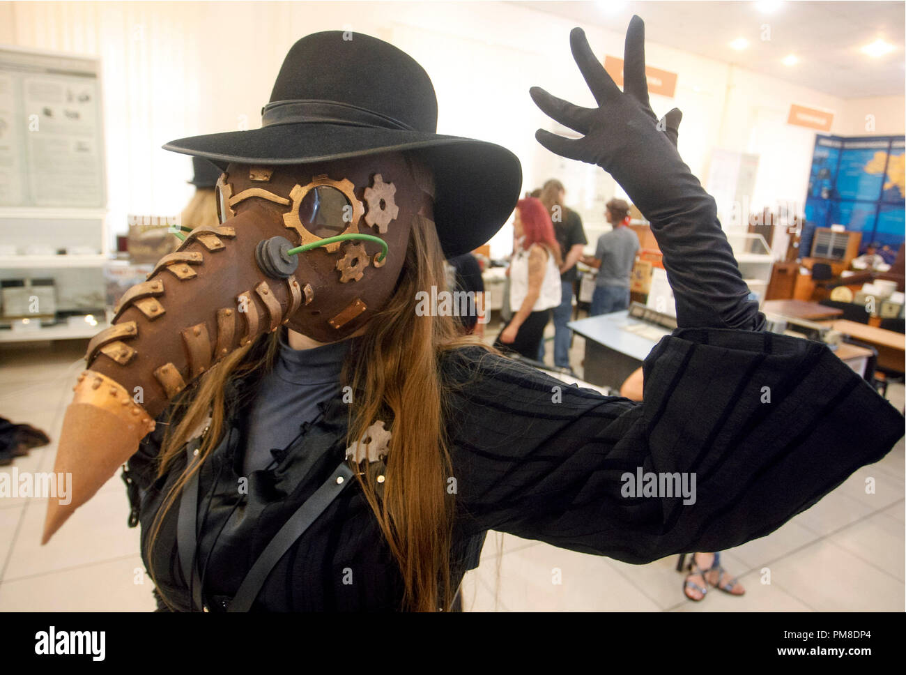 A woman wearing steampunk costumes is seen during 'VI KyivSteamCon' event in Kiev.The Steampunk festival involving workshops, talks, competitions, dances and lectures attracts fans of subgenre steampunk, cosplay and science fiction. Stock Photo