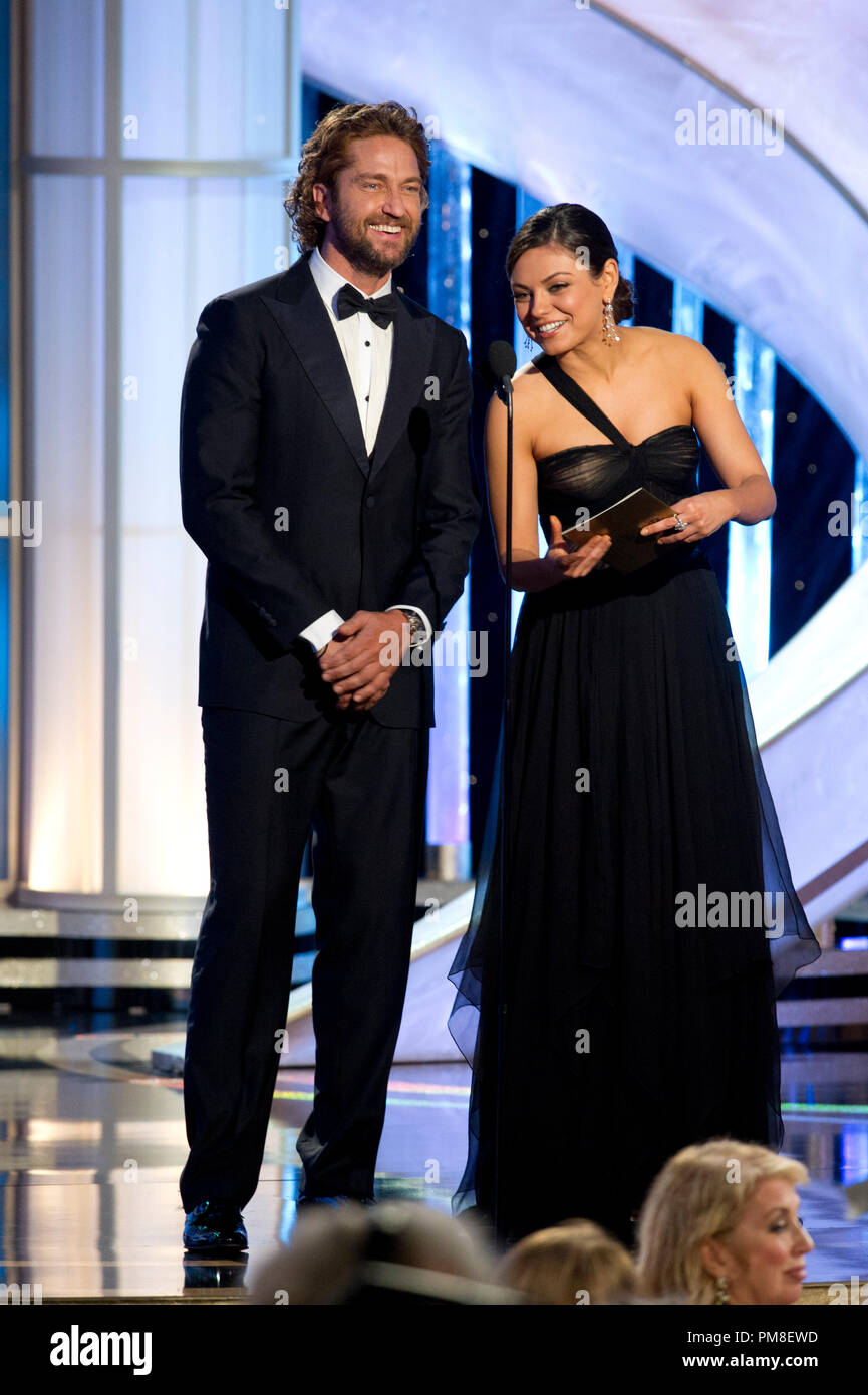 Gerard Butler (left) and Mila Kunis present the award for BEST PERFORMANCE  BY AN ACTOR IN A SUPPORTING ROLE IN A MOTION PICTURE at the 69th Annual Golden  Globe Awards at the