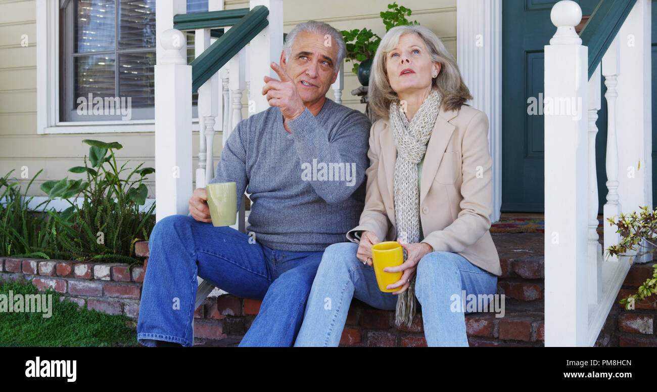 Family on porch talking hi-res stock photography and images - Alamy