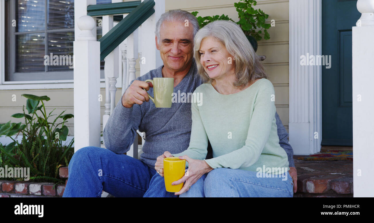 Couple sitting on porch hi-res stock photography and images - Alamy