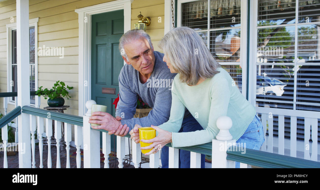 Couple Sitting On Porch High Resolution Stock Photography and Images ...