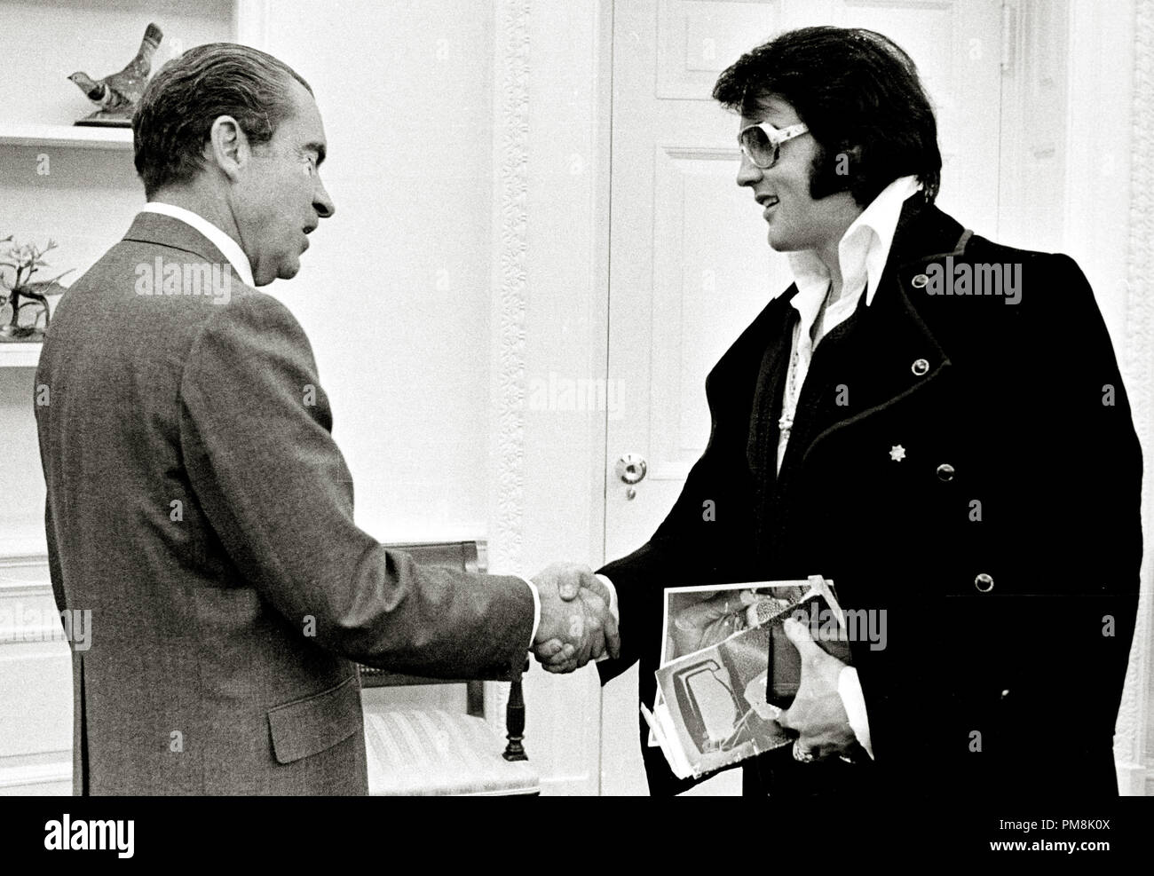 (Archival Classic Cinema - Elvis Presley Retrospective) Elvis Presley meets President Richard M. Nixon, December 21, 1970.  File Reference # 31616 086THA Stock Photo