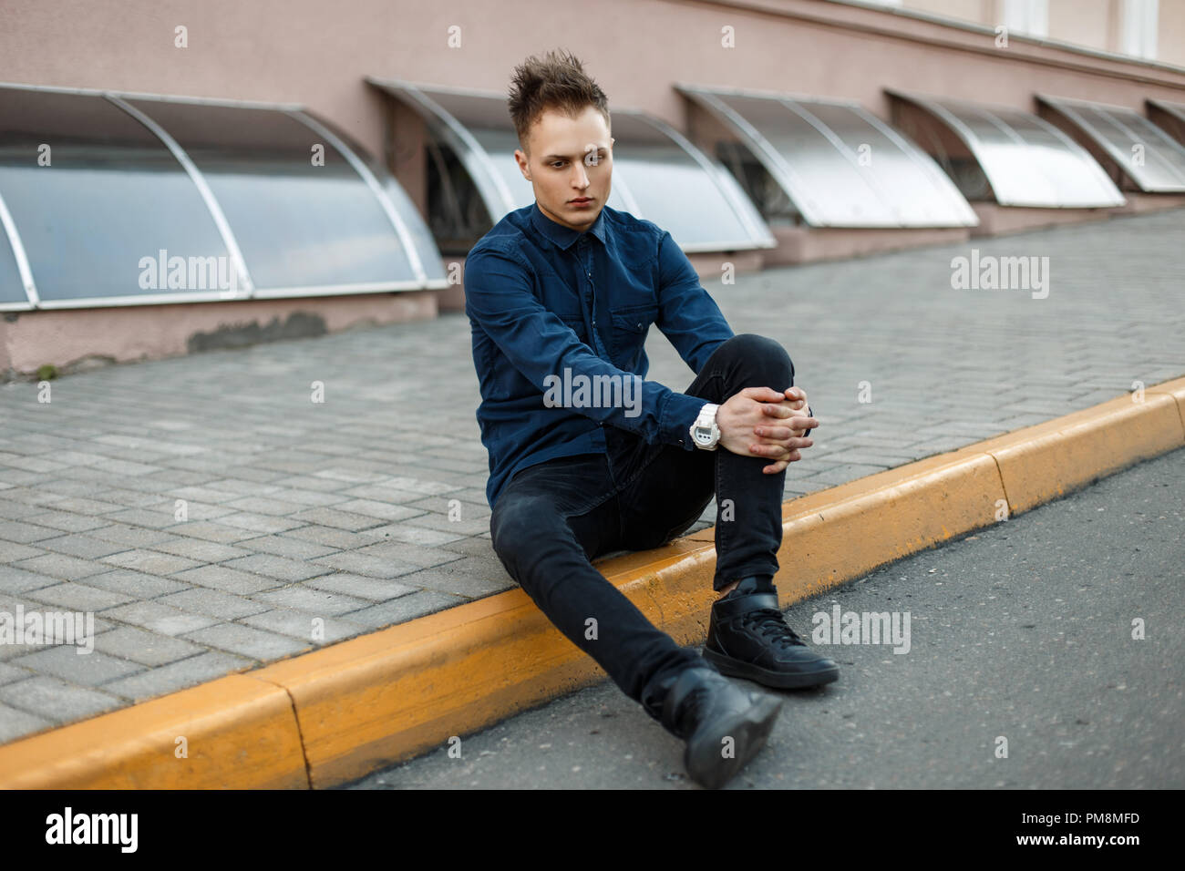 Blue trainers with black jeans deals