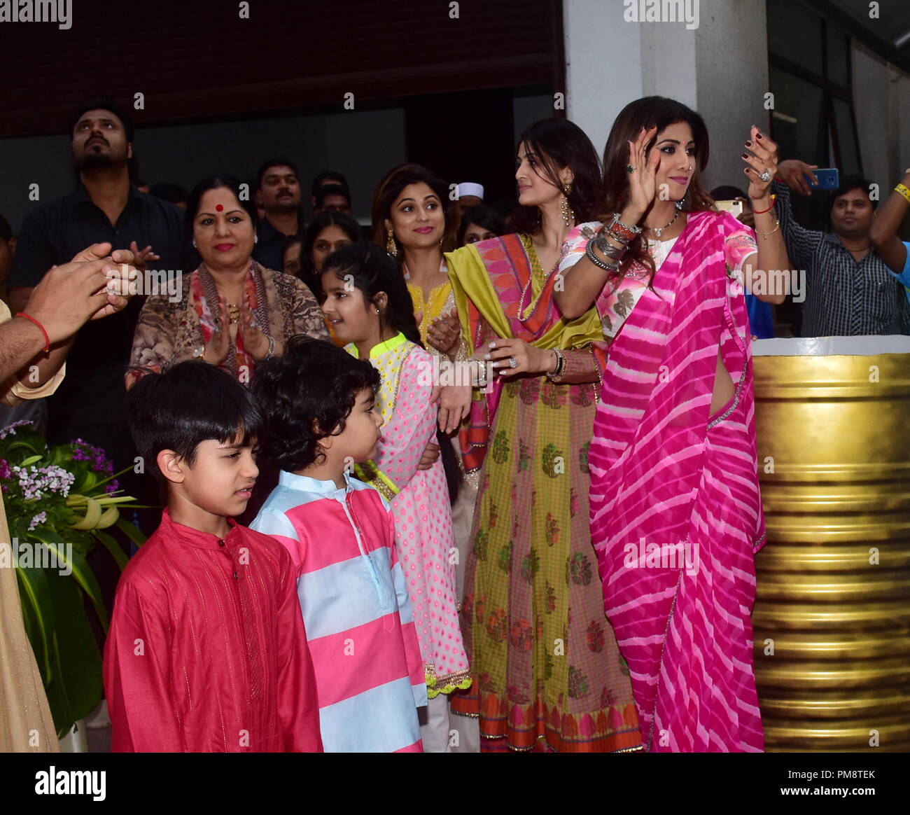 Indian film actress Shilpa Shetty seen rejoicing during a procession at their home. A procession for the immersion of an idol of the elephant-headed Hindu God Lord Ganesh, Hindu devotees take home idols of Lord Ganesha in order to invoke his blessings for wisdom and prosperity. Stock Photo