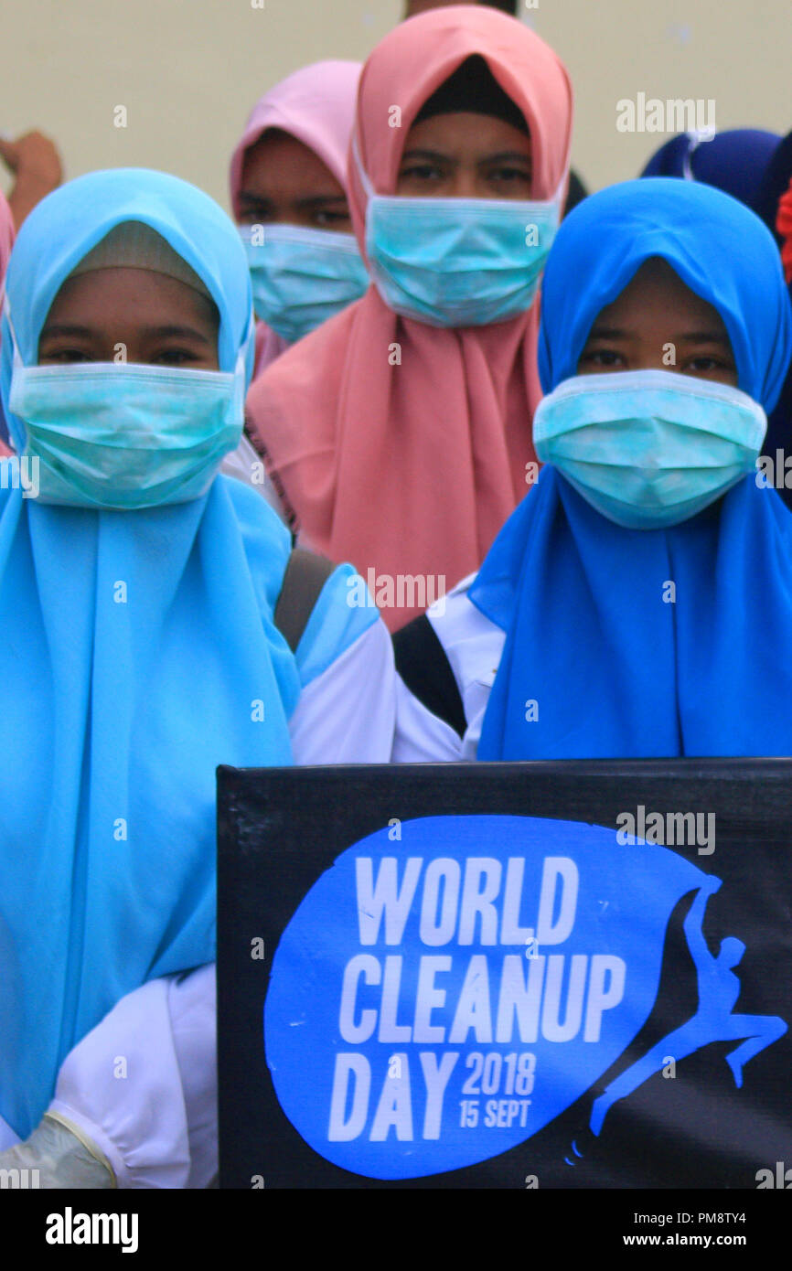 Volunteers seen participating during the world clean up day. World Cleanup Day is a global social action program that aims to combat global waste problems. Today there are 157 countries, 380 million volunteers around the world taking part of cleaning up trashes from road sides and drainage. Stock Photo
