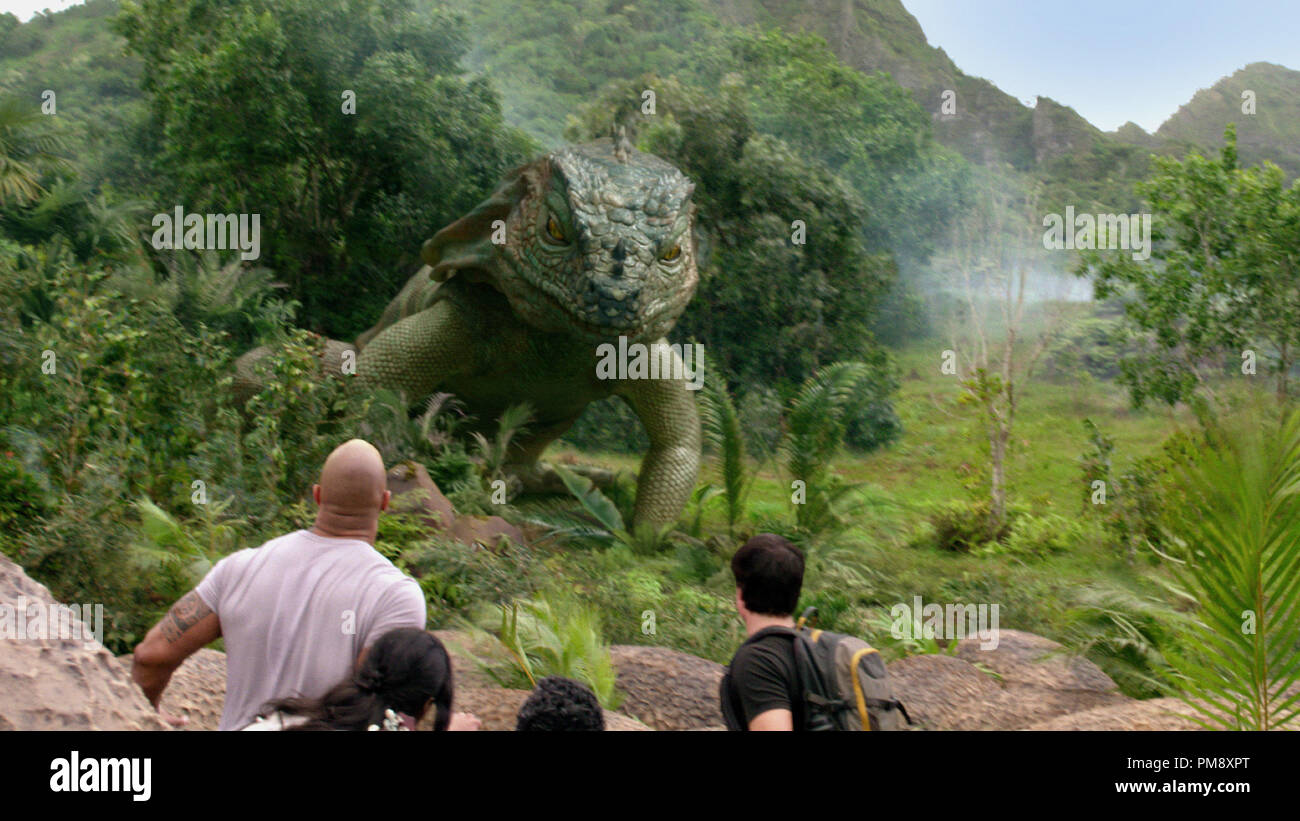 (L-r) DWAYNE JOHNSON as Hank, VANESSA HUDGENS as Kailani, LUIS GUZMÁN as Gabato, and JOSH HUTCHERSON as Sean in New Line Cinema's family adventure JOURNEY 2: THE MYSTERIOUS ISLAND, a Warner Bros. Pictures release. Stock Photo
