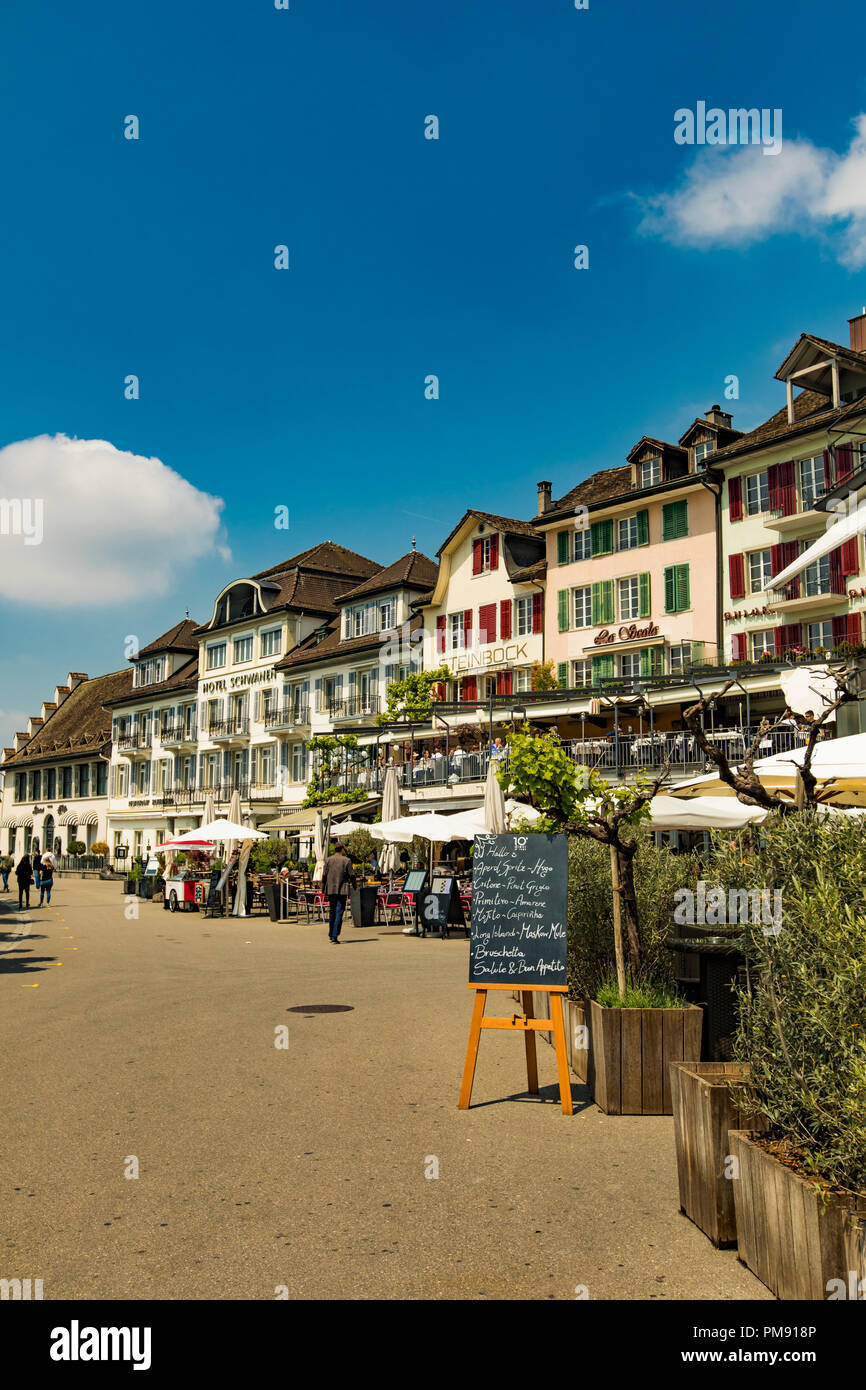 RAPPERSWIL, SWITZERLAND - MAY 18, 2018: Unidentified people sitting in restaurants in Rapperswil, Switzerland. This town located on the upper end of L Stock Photo
