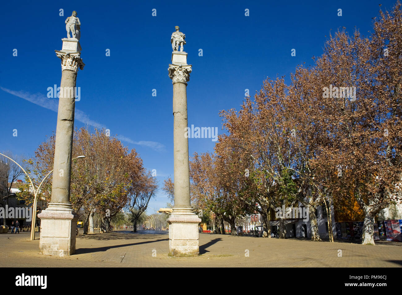 The twin Roman columns with statues of Hercules and Julius Caesar respectively, La Alameda de Hércules, Sevilla, Andalusia, Spain Stock Photo