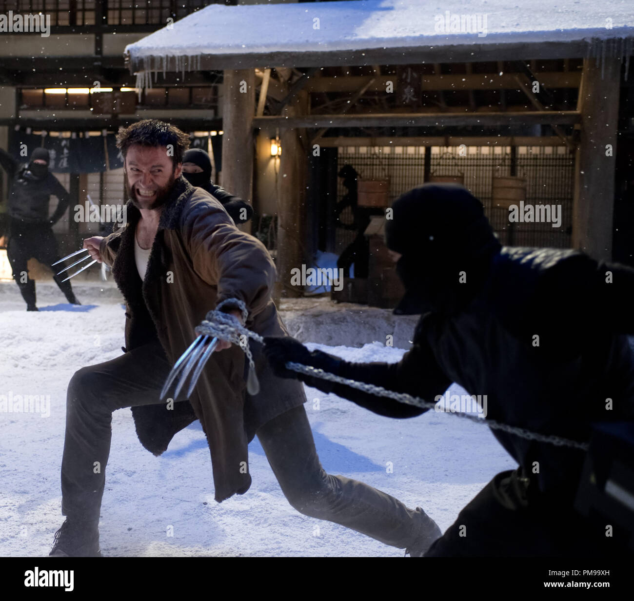 THE WOLVERINE. Logan (Hugh Jackman) battles ninja warriors. Photo credit: Ben Rothstein. Stock Photo