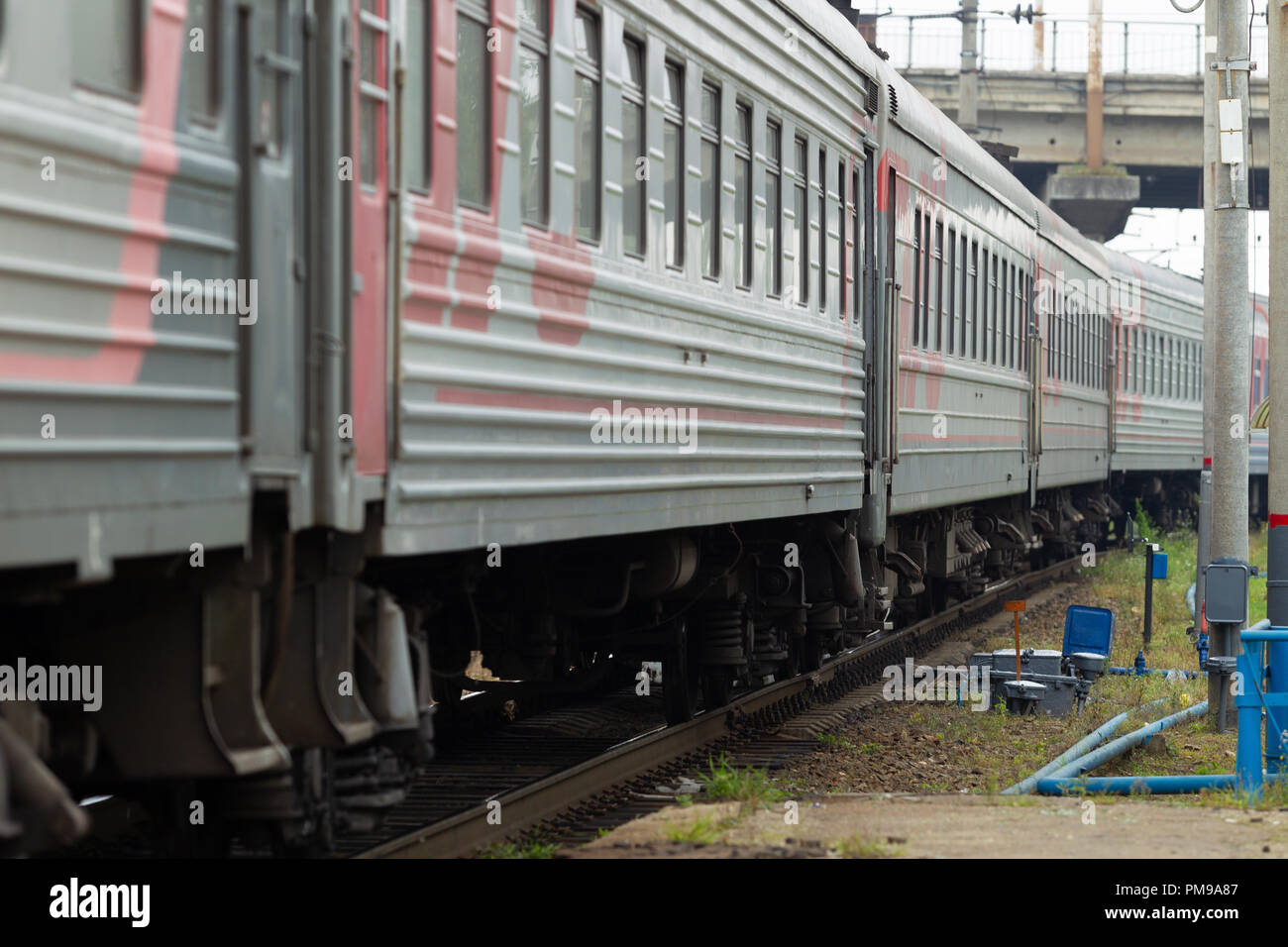Passenger cars on the rails of the railway transport hub. Semaphore. Natural light. Landscape Stock Photo