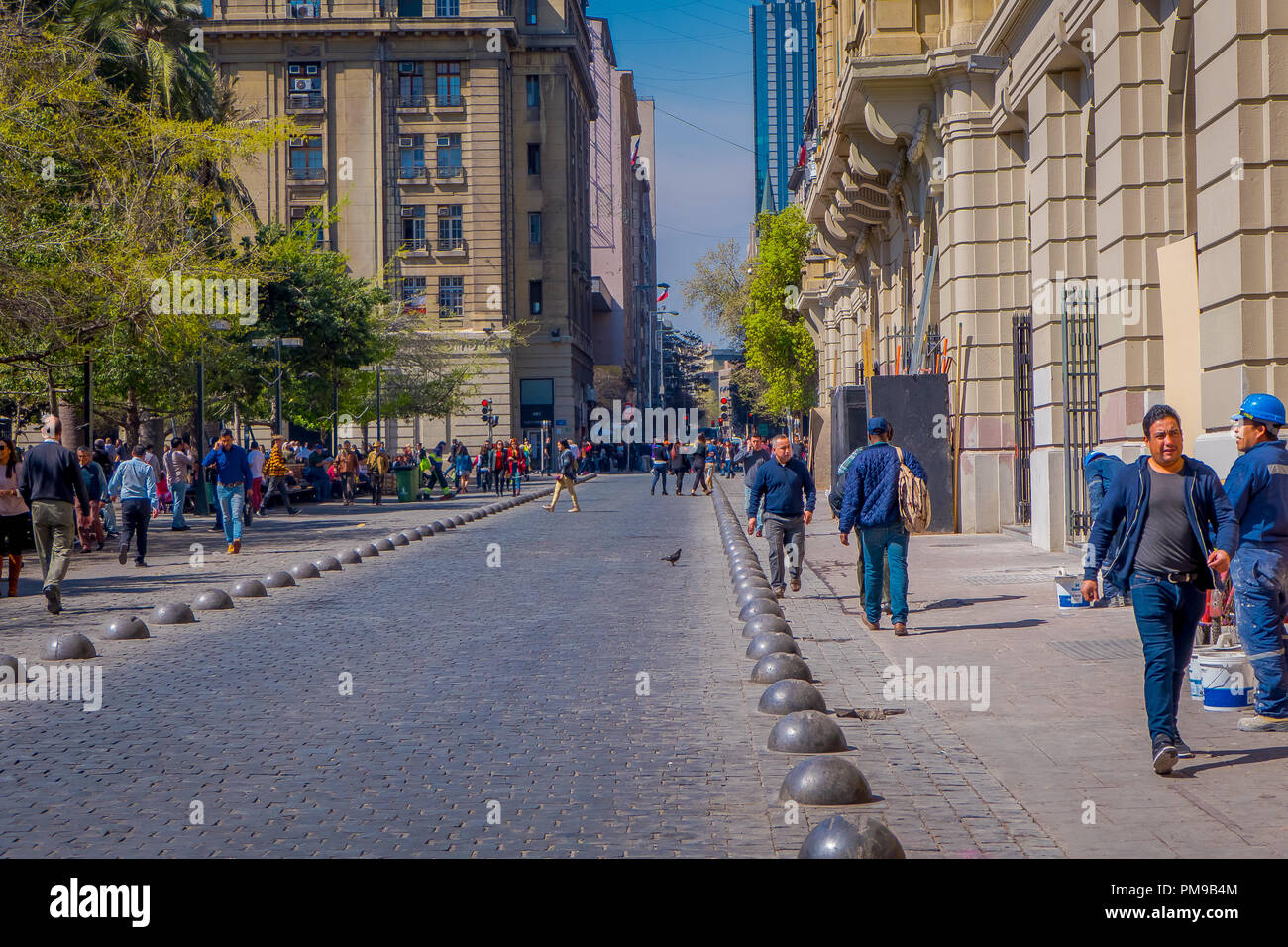 SANTIAGO, CHILE - SEPTEMBER 13, 2018: Unidentified people on the downtown street of the city. This area consists of 19th century neoclassical colonial architecture Stock Photo