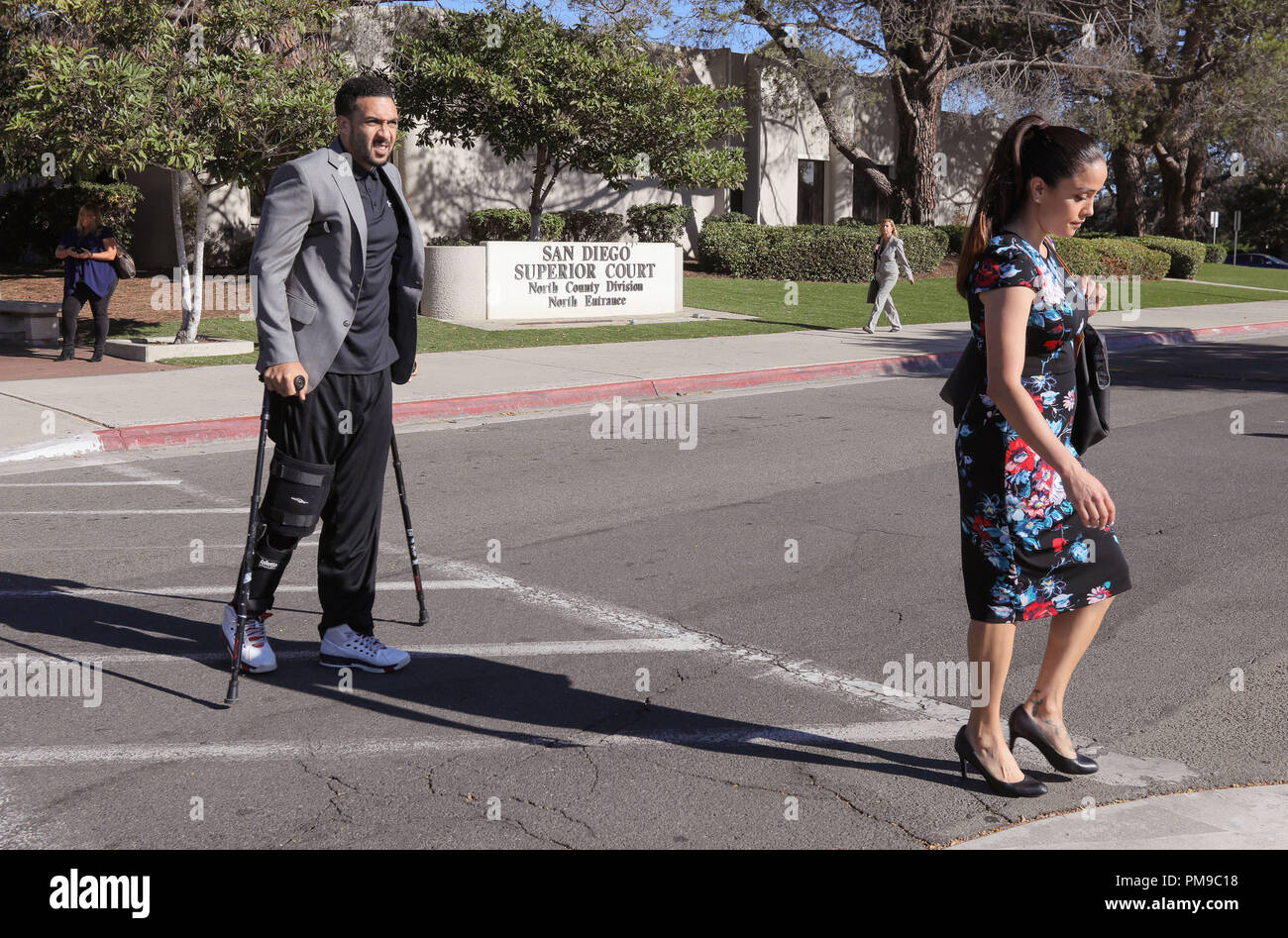 Vista, California, USA. 17th Sep, 2018. KELLEN WINSLOW II and his wife Janelle leave San Diego Superior Court after a preliminary hearing scheduled for today was postponed until October 15th. Winslow is charged with raping an unconscious teen in 2003. His attorneys asked to have the hearing postponed as their client recovers from knee-replacement surgery. Credit: Charlie Neuman/ZUMA Wire/Alamy Live News Stock Photo