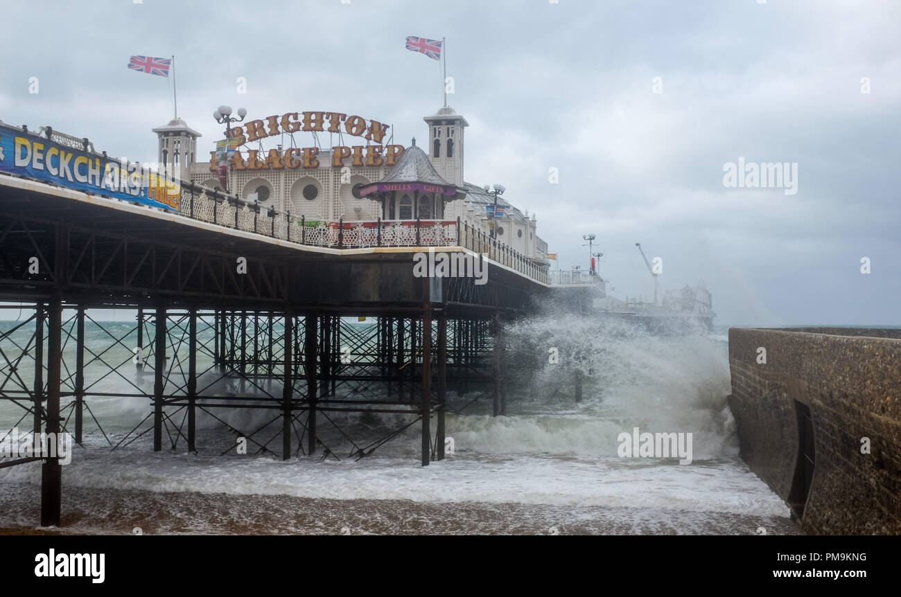 Brighton UK 18th September 2018 - Waves crash on to Brighton seafront by the Brighton Palace Pier as Storm Helene starts to hit Britain with winds of up to 70 mph expected in some parts of the UK over the next few days Credit: Simon Dack/Alamy Live News Stock Photo