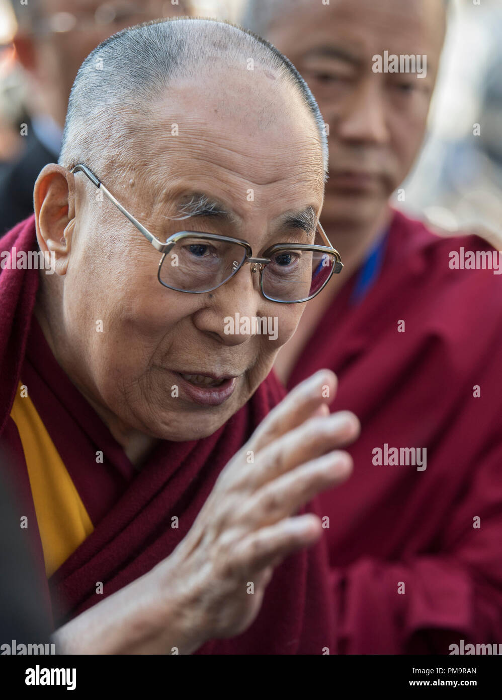 The spiritual leader Dalai Lama gives a speech to festival goers at the  Stone Circle, Glastonbury Festival, at Worthy Farm in Somerset, England, as  a special guest of the festival, Sunday June