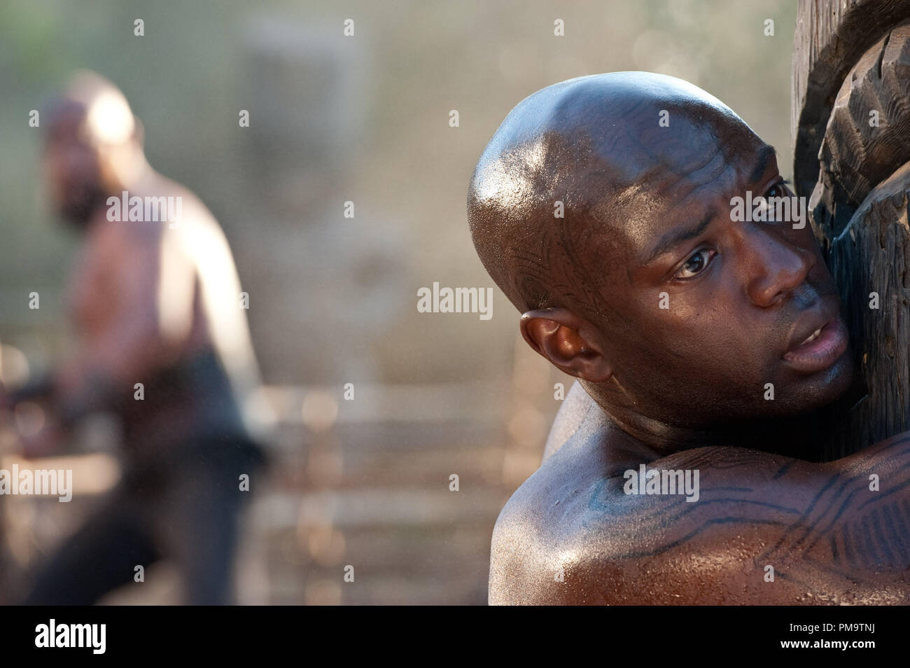 DAVID GYASI (right) as Autua in the epic drama “CLOUD ATLAS,” distributed domestically by Warner Bros. Pictures and in select international territories. Stock Photo