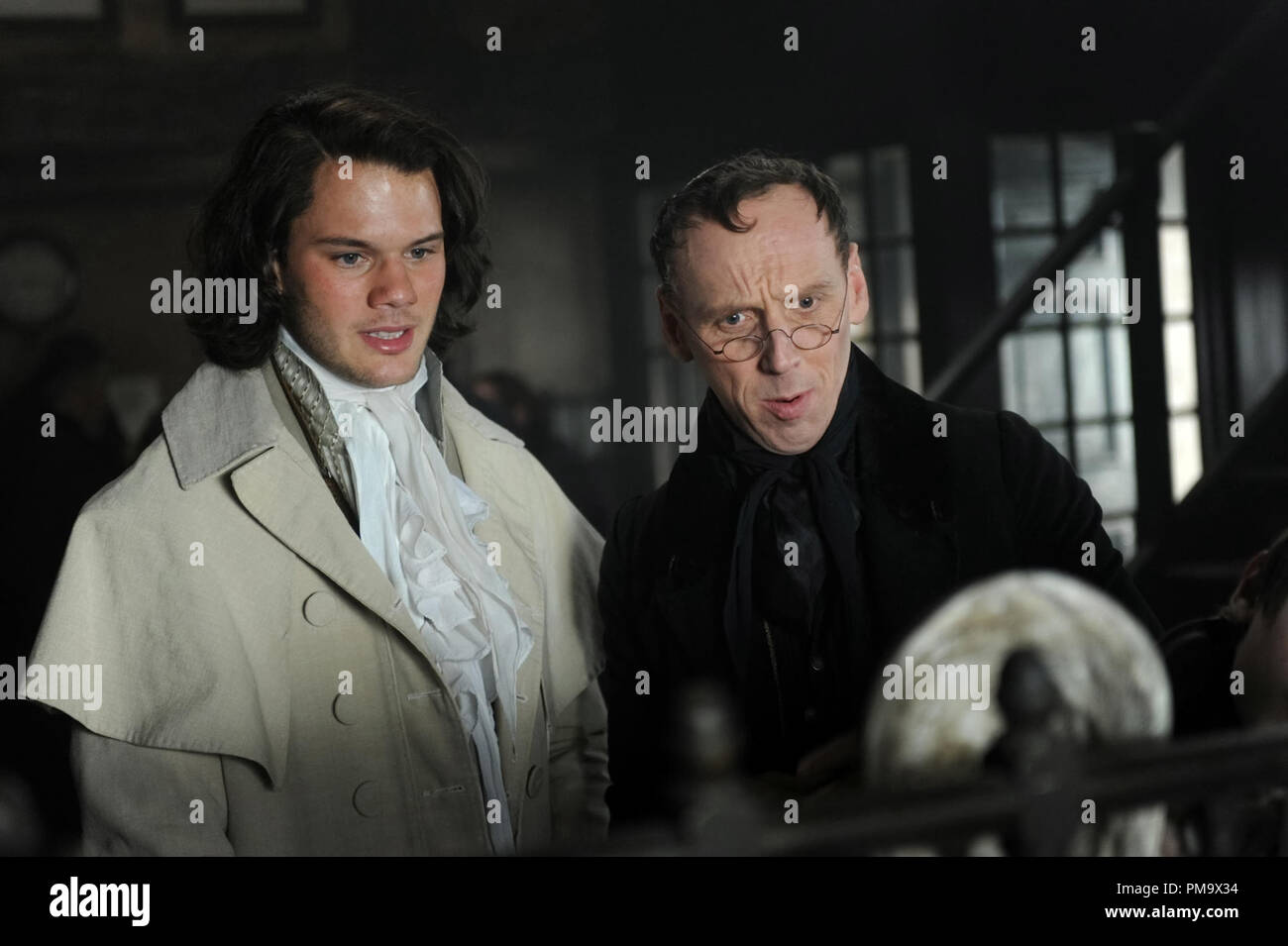 Jeremy Irvine stars as Pip and Ewen Bremner stars as Wemmick in Outsource Media Group's Great Expectations (2012) Stock Photo