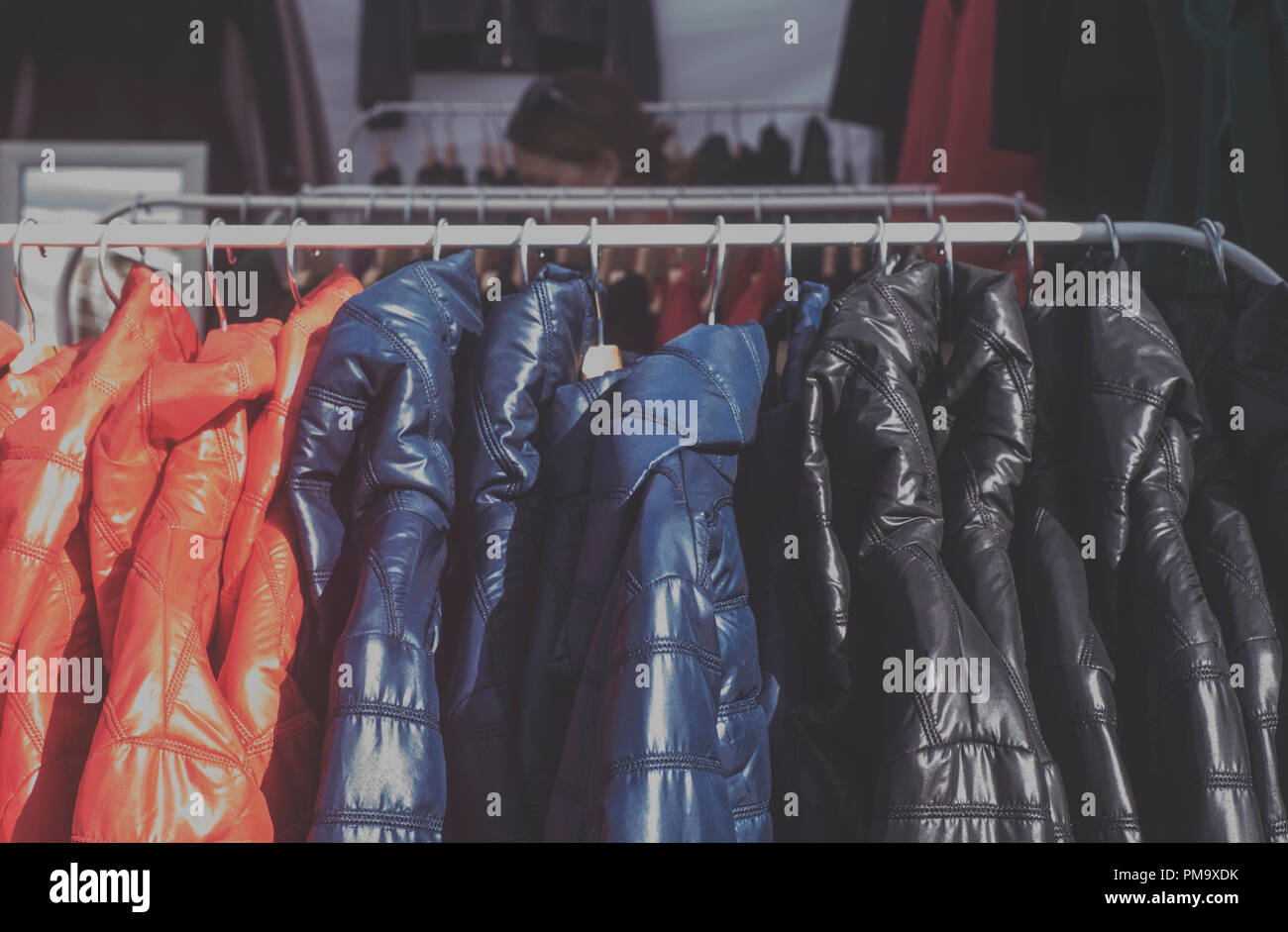 Fashionable jacket in a boutique store Stock Photo Alamy