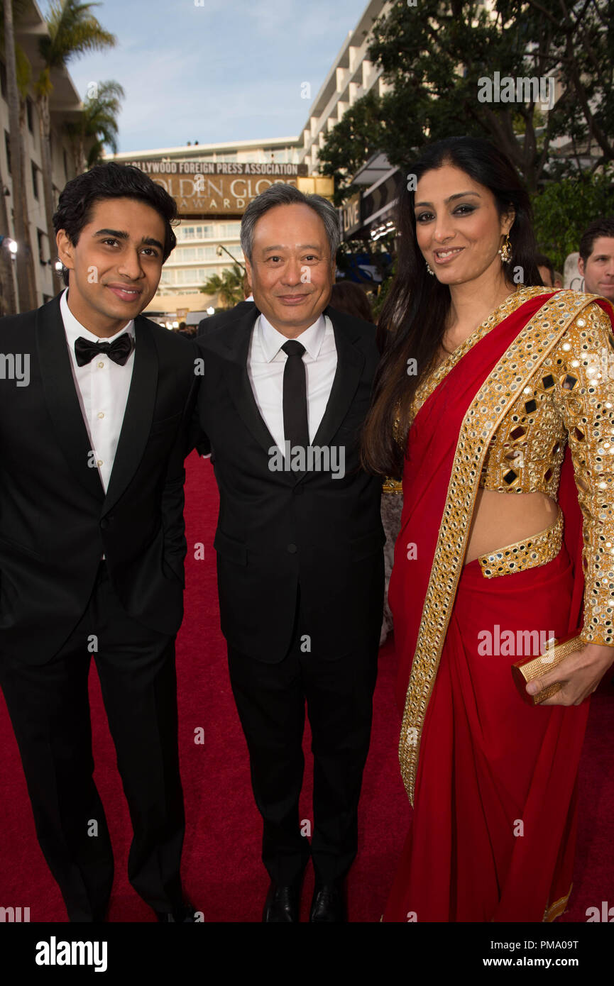 Nominated for BEST DIRECTOR – MOTION PICTURE for “LIFE OF PI”, director Ang Lee (center) attends the 70th Annual Golden Globe Awards with Suraj Sharma (left) and actress Tabu (right) at the Beverly Hilton in Beverly Hills, CA on Sunday, January 13, 2013. Stock Photo