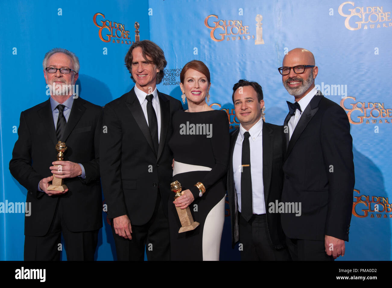 For BEST MINI-SERIES OR MOTION PICTURE MADE FOR TELEVISION, the Golden Globe is awarded to “GAME CHANGE” (HBO), produced by Playtone and Everyman Pictures in association with HBO Films. Gary Goetzman, Jay Roach, Julianne Moore, Danny Strong, and Steven Shareshian pose with the award backstage in the press room at the 70th Annual Golden Globe Awards at the Beverly Hilton in Beverly Hills, CA on Sunday, January 13, 2013. Stock Photo