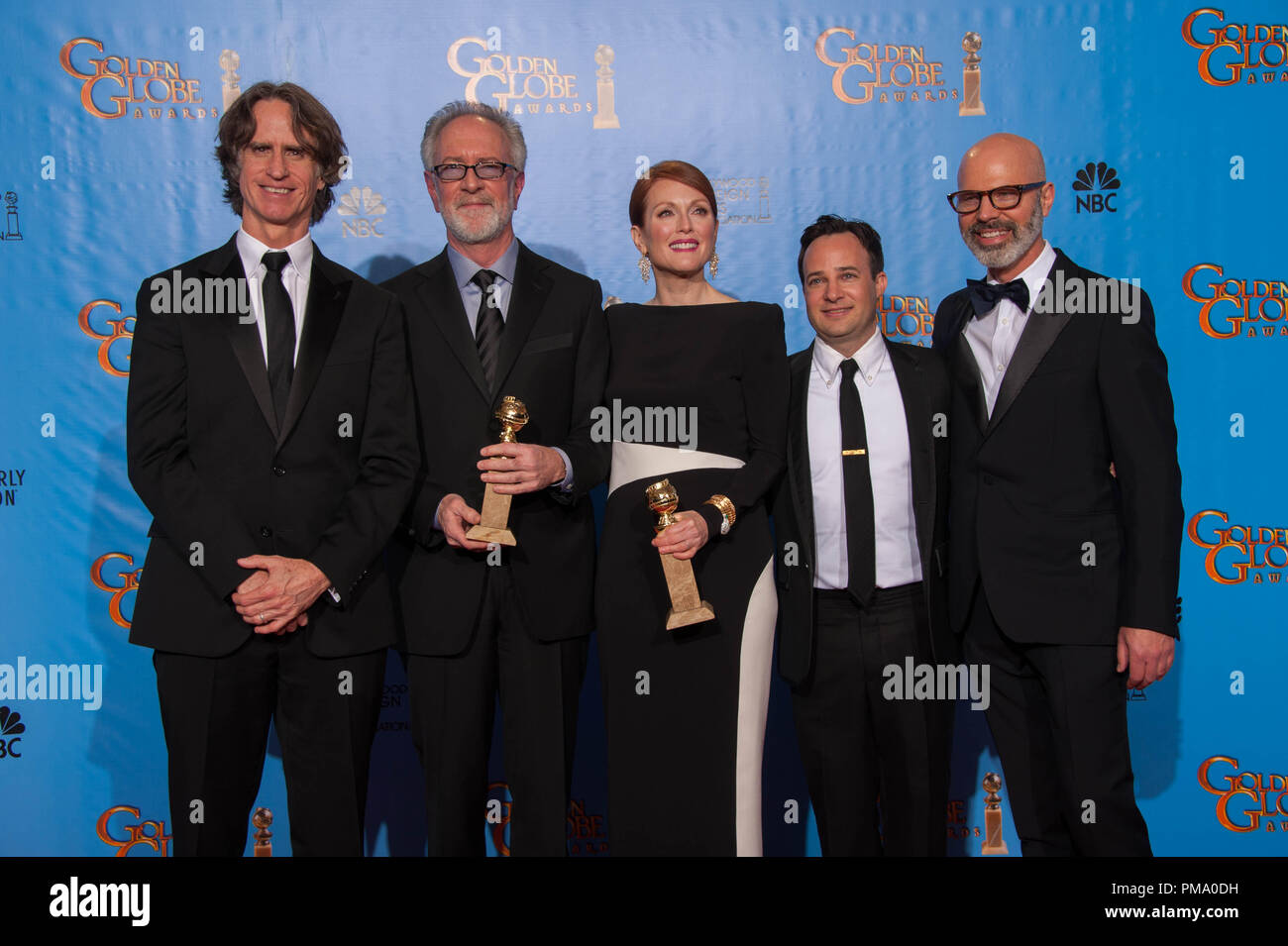 For BEST MINI-SERIES OR MOTION PICTURE MADE FOR TELEVISION, the Golden Globe is awarded to “GAME CHANGE” (HBO), produced by Playtone and Everyman Pictures in association with HBO Films. Jay Roach, Gary Goetzman, Julianne Moore, Danny Strong, and Steven Shareshian pose with the award backstage in the press room at the 70th Annual Golden Globe Awards at the Beverly Hilton in Beverly Hills, CA on Sunday, January 13, 2013. Stock Photo