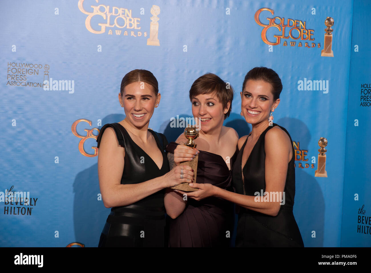 For BEST TELEVISION SERIES – COMEDY OR MUSICAL, the Golden Globe is awarded to “GIRLS” (HBO), produced by Apatow Productions and I am Jenni Konner Productions in association with HBO Entertainment. Zosia Mamet, Lena Dunham, and Allison Williams pose with the award backstage in the press room at the 70th Annual Golden Globe Awards at the Beverly Hilton in Beverly Hills, CA on Sunday, January 13, 2013. Stock Photo