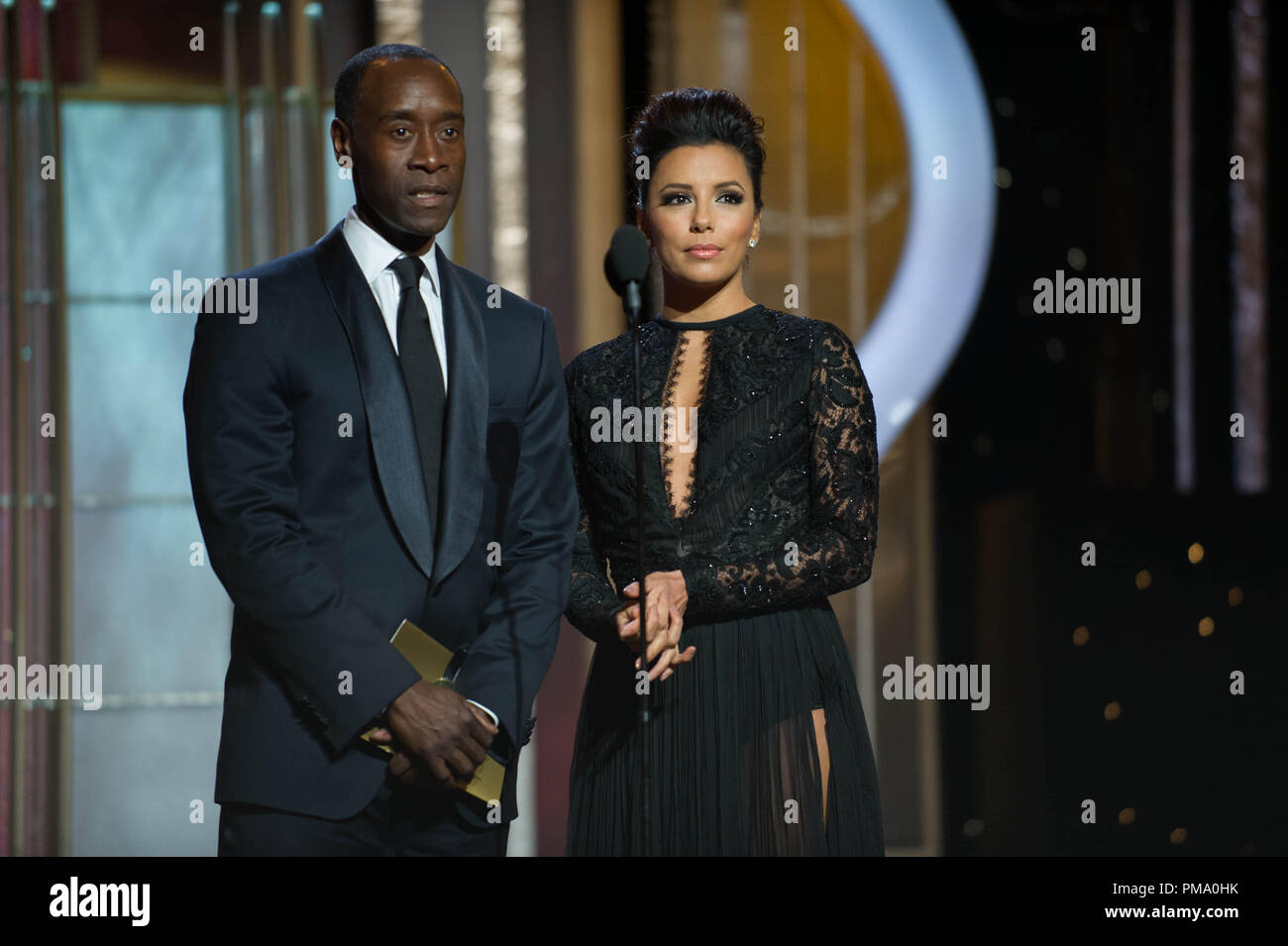 Don Cheadle and Eva Longoria present the Best  Mini Series or TV Movie at the 70th Annual Golden Globe Awards at the Beverly Hilton in Beverly Hills, CA on Sunday, January 13, 2013. Stock Photo