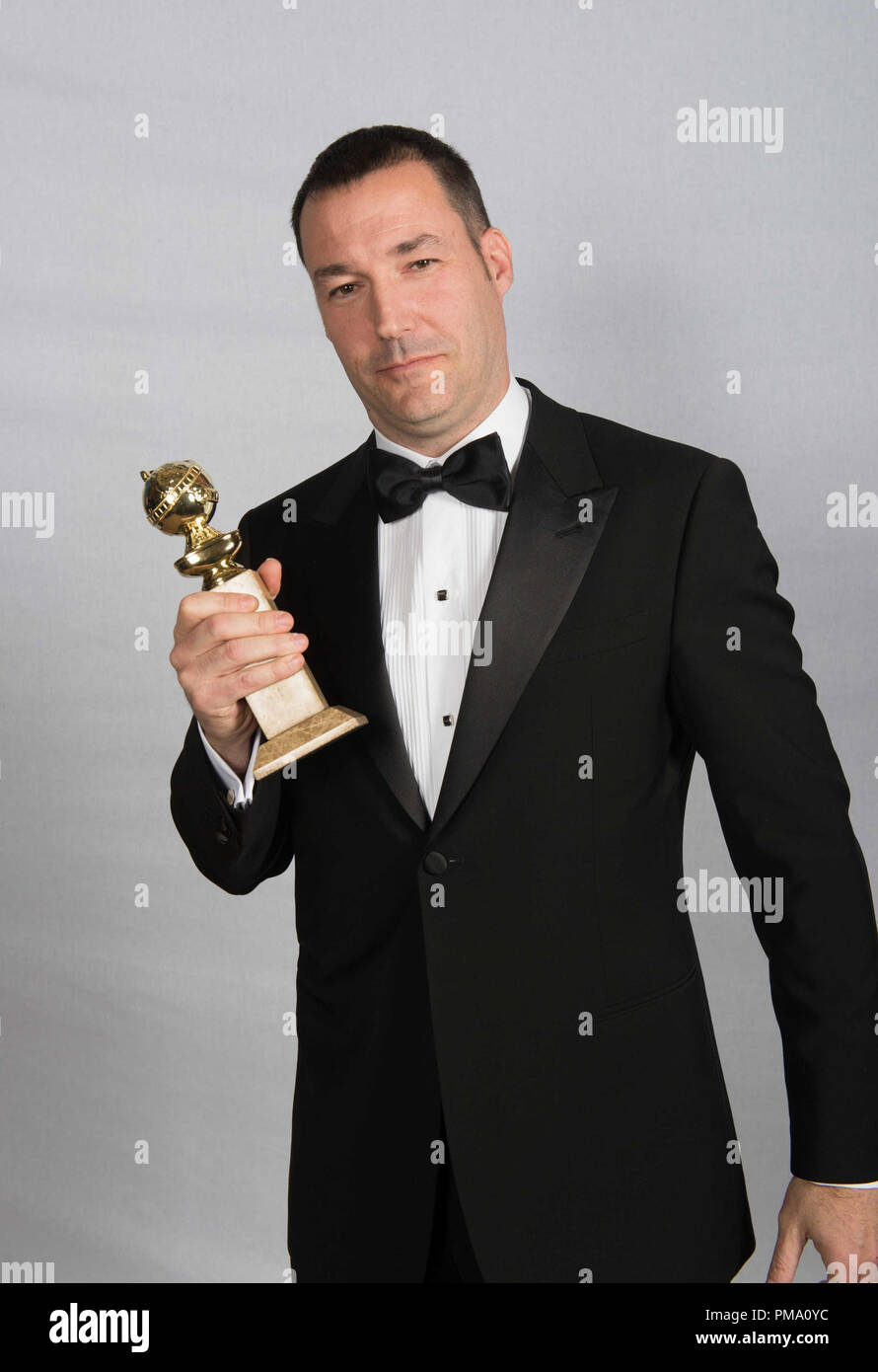 For BEST ANIMATED FEATURE FILM, the Golden Globe is awarded to “BRAVE”, produced by Walt Disney Pictures, Pixar Animation Studios; Walt Disney Pictures. Mark Andrews poses with the award backstage in the press room at the 70th Annual Golden Globe Awards at the Beverly Hilton in Beverly Hills, CA on Sunday, January 13, 2013. Stock Photo