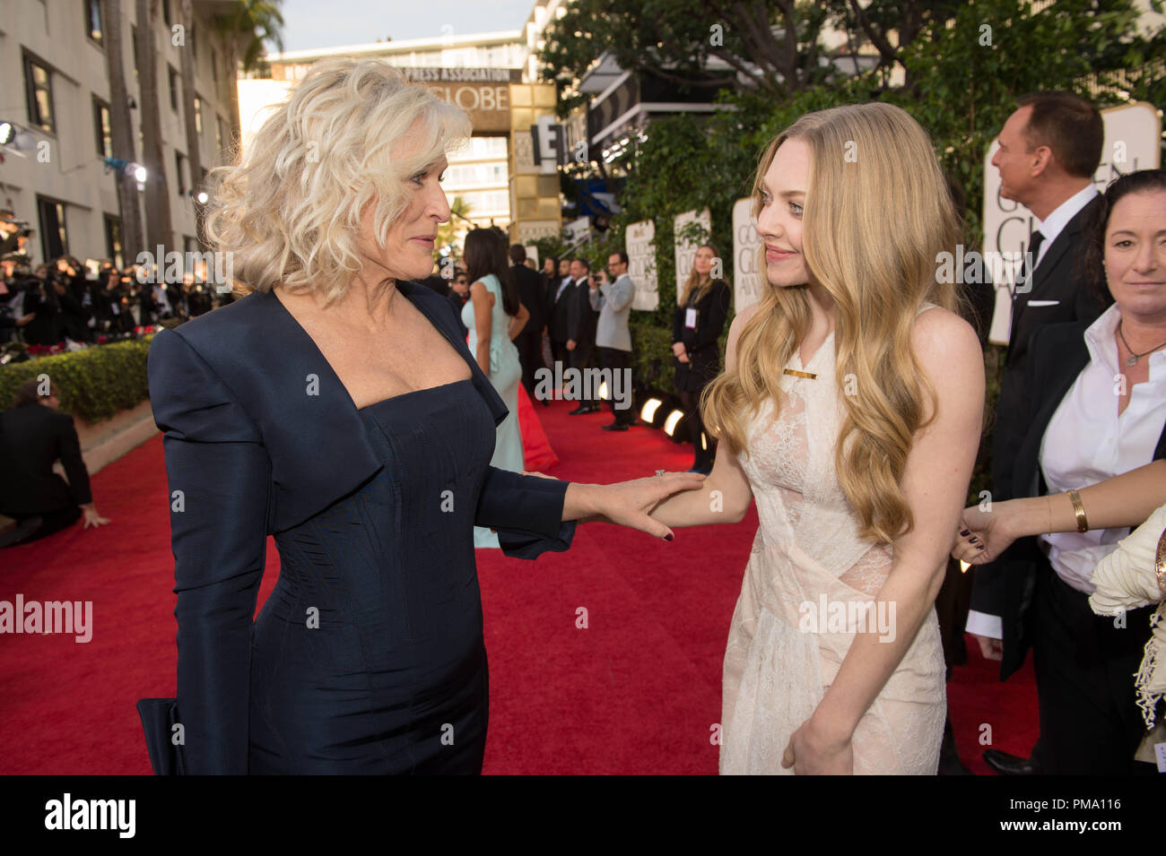 Nominated for BEST PERFORMANCE BY AN ACTRESS IN A TELEVISION SERIES – DRAMA for her role in “DAMAGES”, actress Glenn Close (L) greets actress Amanda Seyfried at the 70th Annual Golden Globe Awards at the Beverly Hilton in Beverly Hills, CA on Sunday, January 13, 2013. Stock Photo