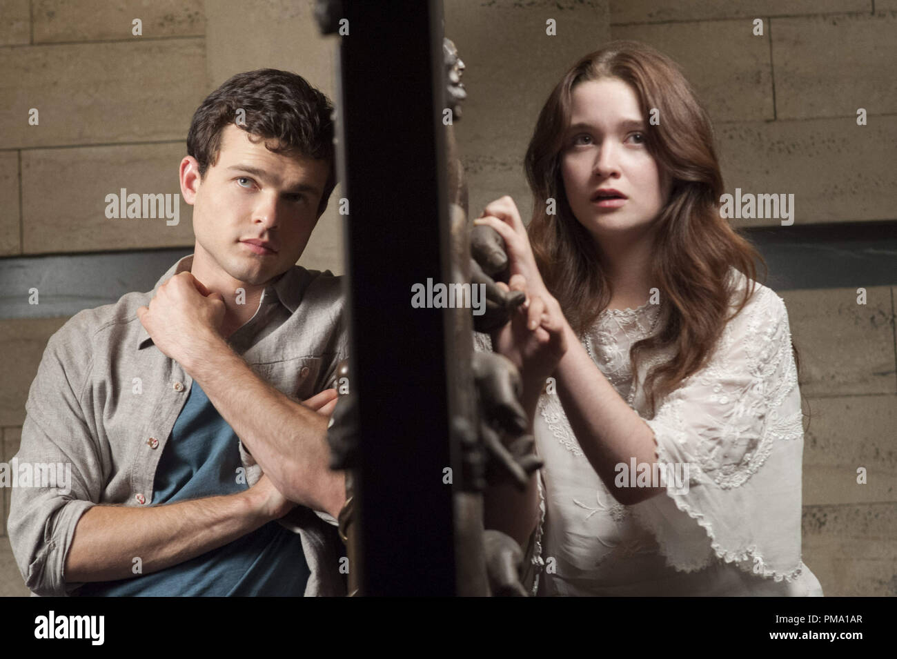 (L -r) ALDEN EHRENREICH as Ethan Wate and ALICE ENGLERT as Lena Duchannes in Alcon Entertainment's supernatural love story “BEAUTIFUL CREATURES,” a Warner Bros. Pictures release. Stock Photo