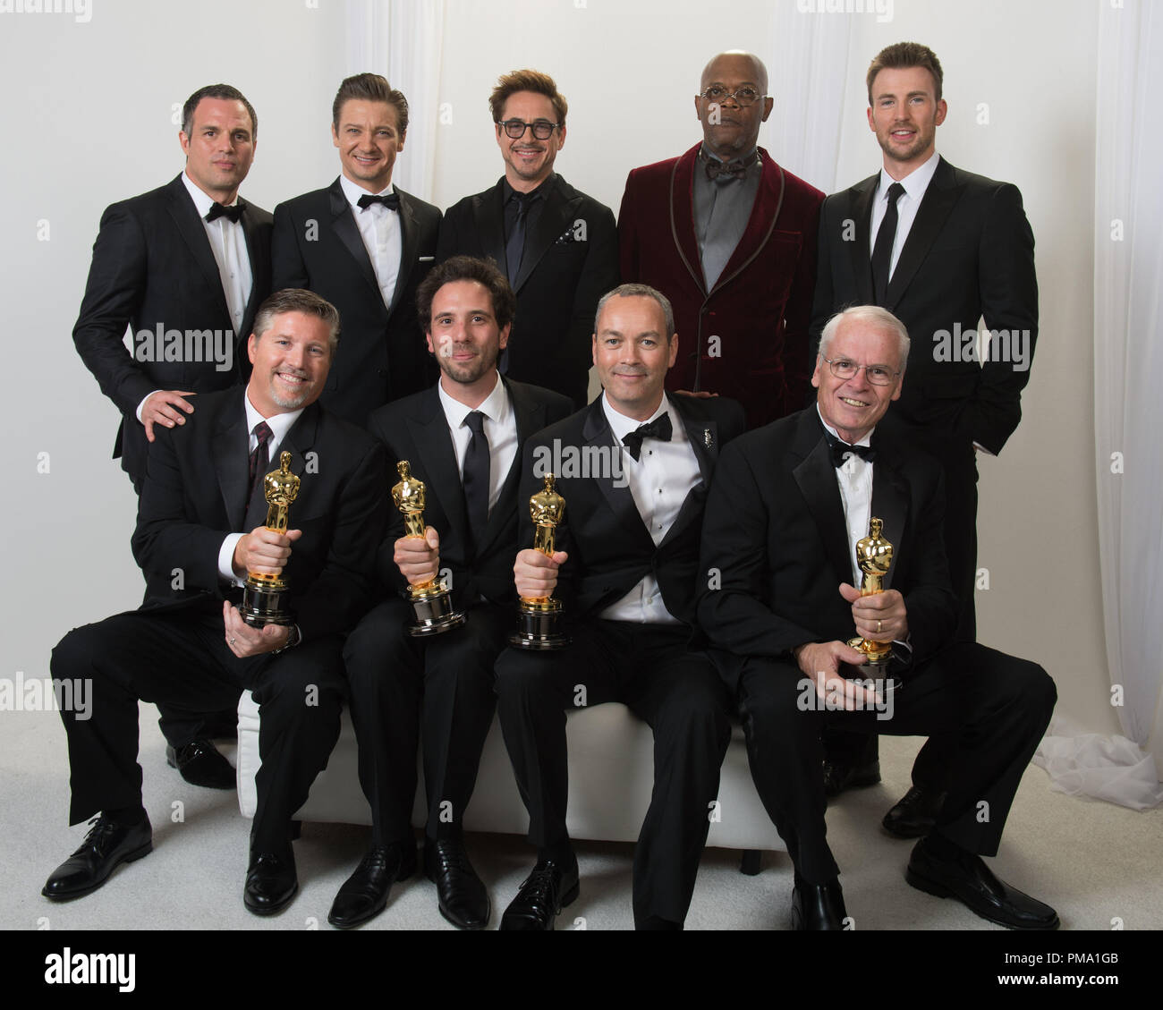 After winning the category achievement in visual effects for work on “Life of Pi”, Bill Westenhofer, Guillaume Rocheron, Erik-Jan De Boer and Donald R. Elliott pose backstage with the Oscar® and Mark Ruffalo, Jeremy Renner, Robert Downey Jr., Samuel L. Jackson, and Chris Evans during the live ABC network broadcast of The Oscars® from the Dolby® Theatre in Hollywood, CA, Sunday, February 24, 2013. Stock Photo