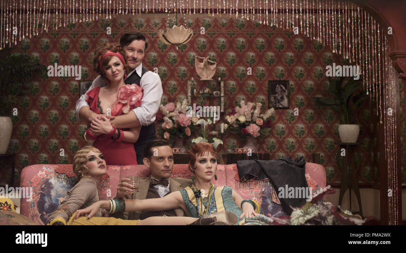 (Clockwise from top left) ISLA FISHER as Myrtle Wilson, JOEL EDGERTON as Tom Buchanan, ADELAIDE CLEMENS as Catherine, TOBEY MAGUIRE as Nick Carraway and KATE MULVANY as Mrs. McKee in Warner Bros. Pictures' and Village Roadshow Pictures' drama 'THE GREAT GATSBY,' a Warner Bros. Pictures release. Stock Photo