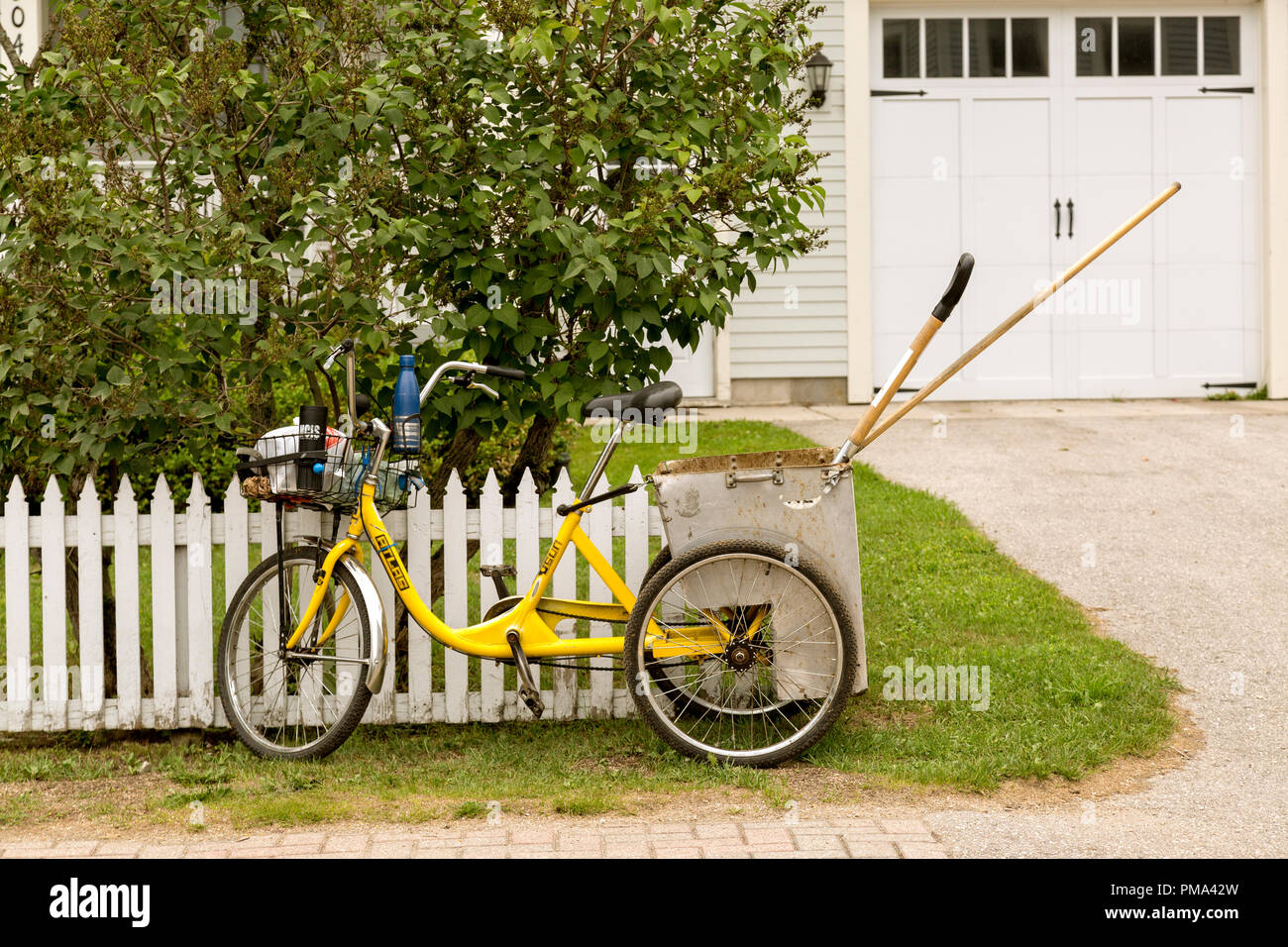 Bicycle adapted to carry garden tools, on Mackinac Island, Michigan where no motor vehicles are allowed. ilocated in the Midwest, United States. Stock Photo