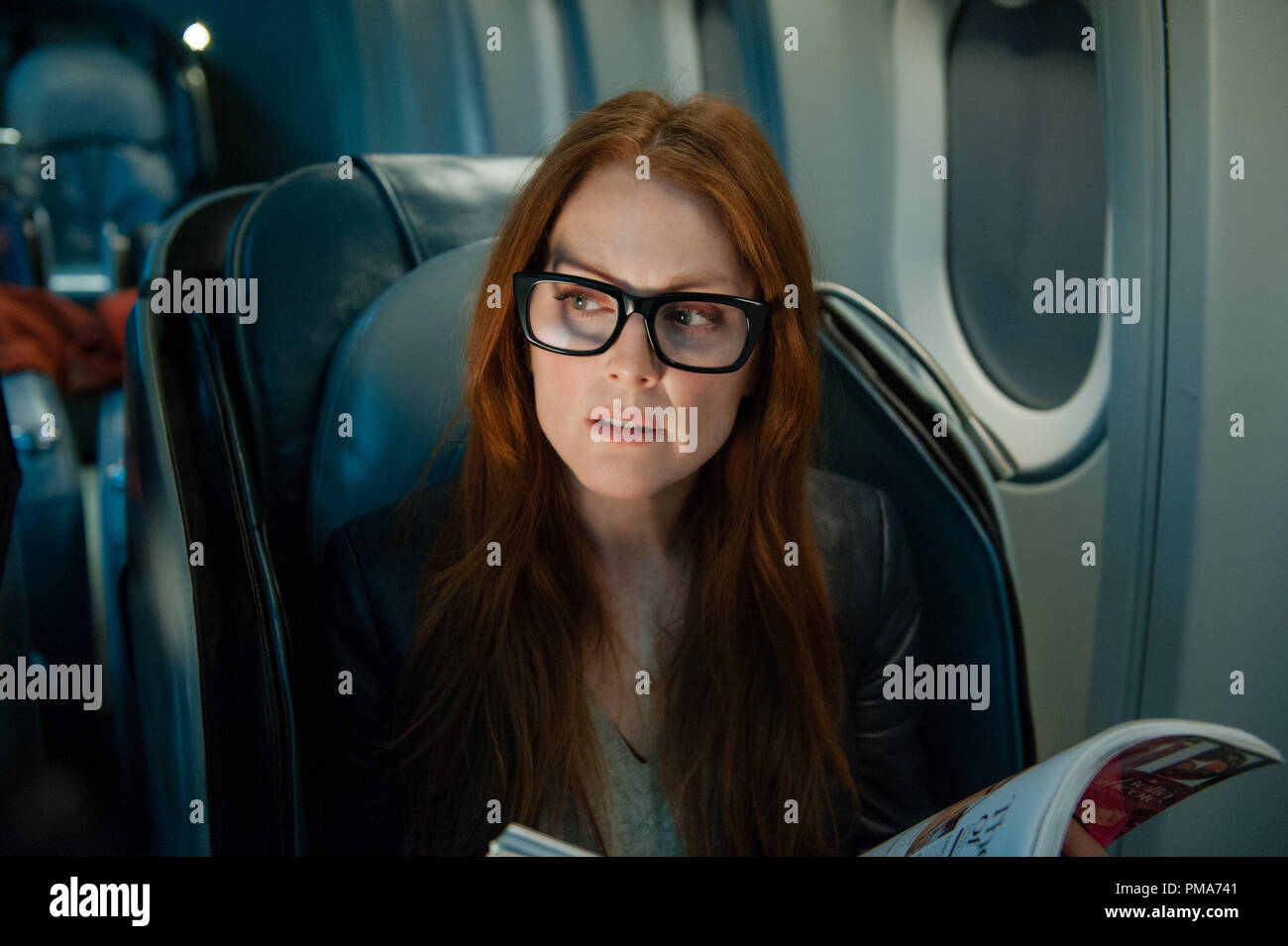 JULIANNE MOORE stars as passenger Jen Summers in 'Non-Stop'  (2014) Stock Photo