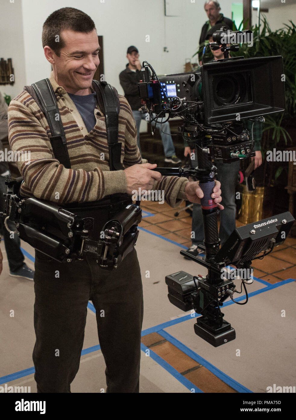 Director Jason Bateman holding the Steadicam on the set of his subversive comedy Bad Words, a Focus Features release Stock Photo