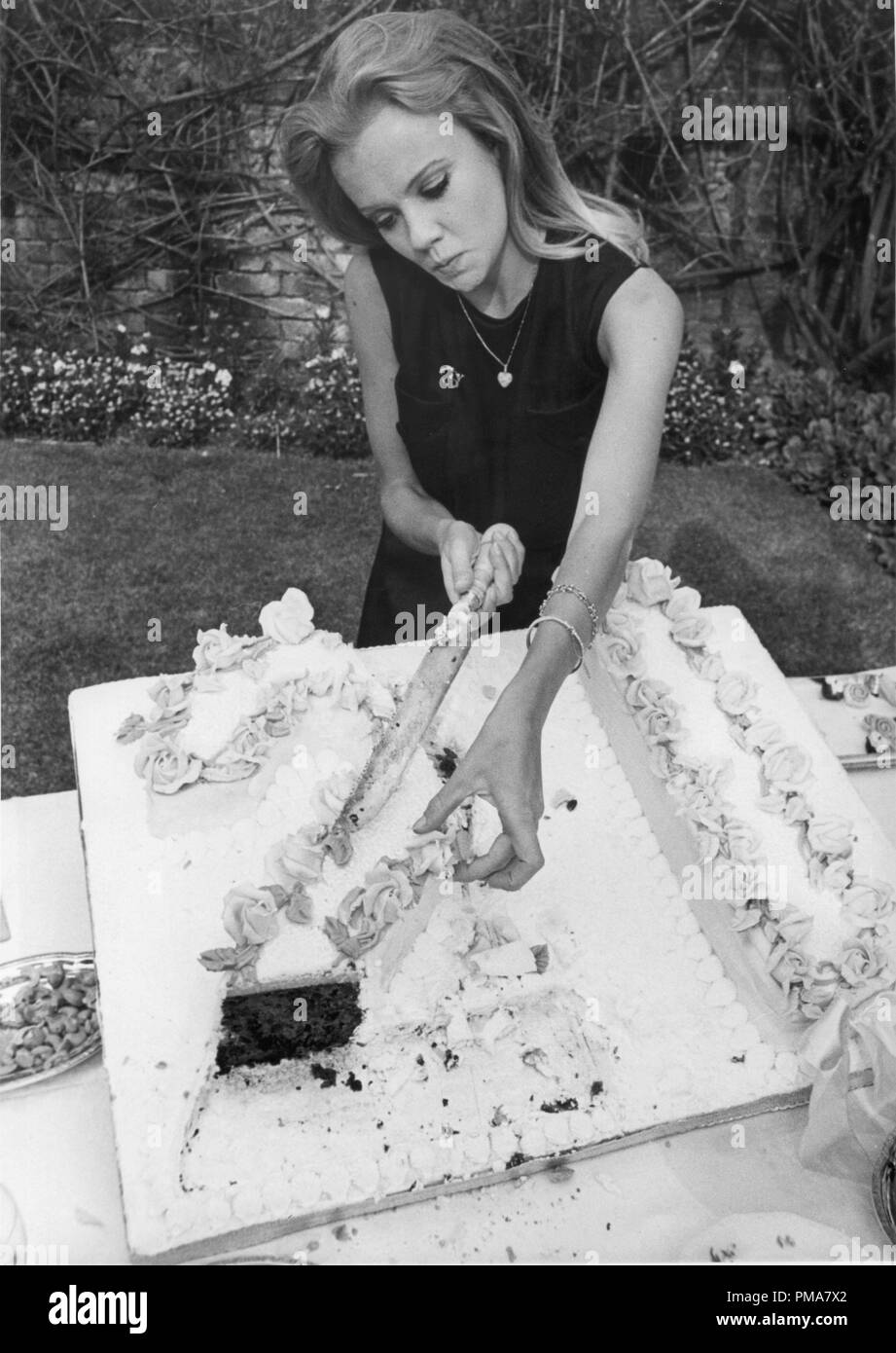 Hayley Mills cutting her cake at her 21st birthday party, 1967 © JRC