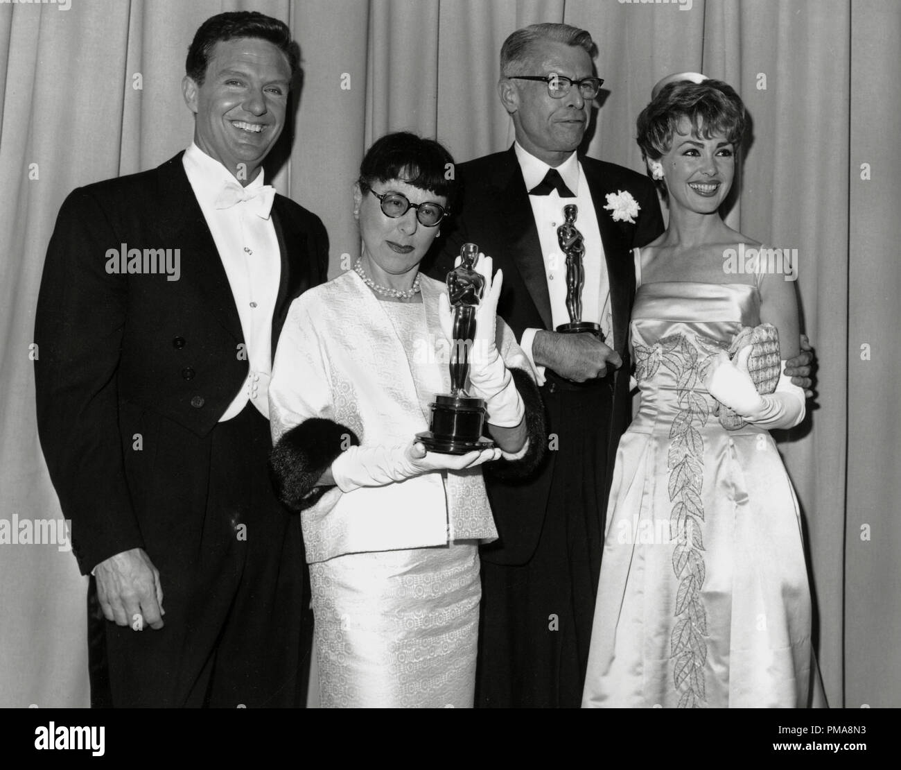 Robert Stack, Edith Head and Edward Stevenson at the 33rd Annual Acdaemy Awards, 1961   File Reference # 31955 629THA Stock Photo