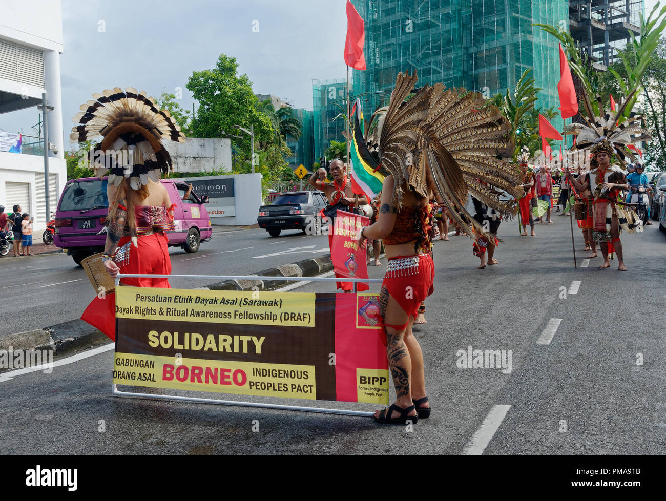 Gawai celebration parade, Borneo natives in traditional dress, Kuching