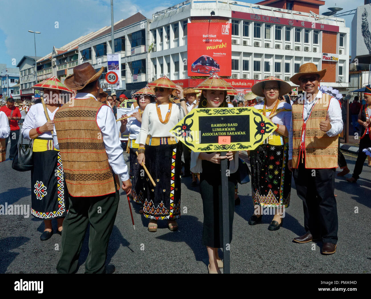 Gawai celebration parade, Borneo natives in traditional dress, Kuching, Sarawak, Malaysia Stock Photo