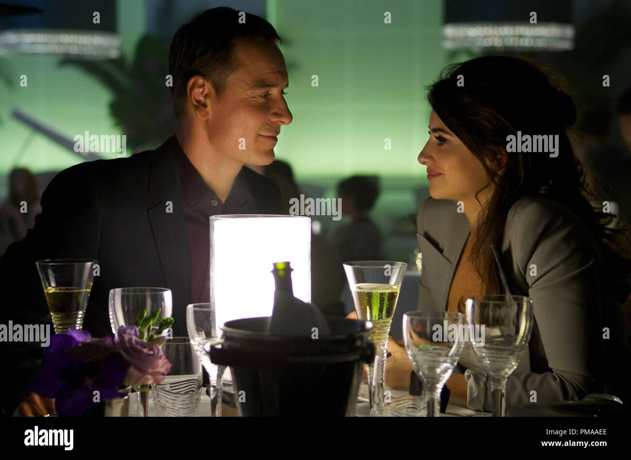 The Counselor (Michael Fassbender) and Laura (Penelope Cruz) enjoy a romantic evening. Stock Photo