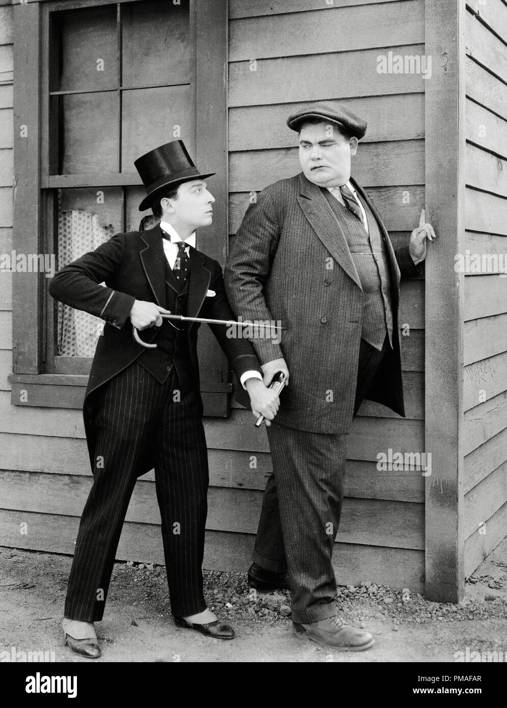 Silent film comedian Buster Keaton and Kewpie Morgan in a scene from 'Sherlock Junior' 1924 MGM File Reference # 32633 429THA Stock Photo