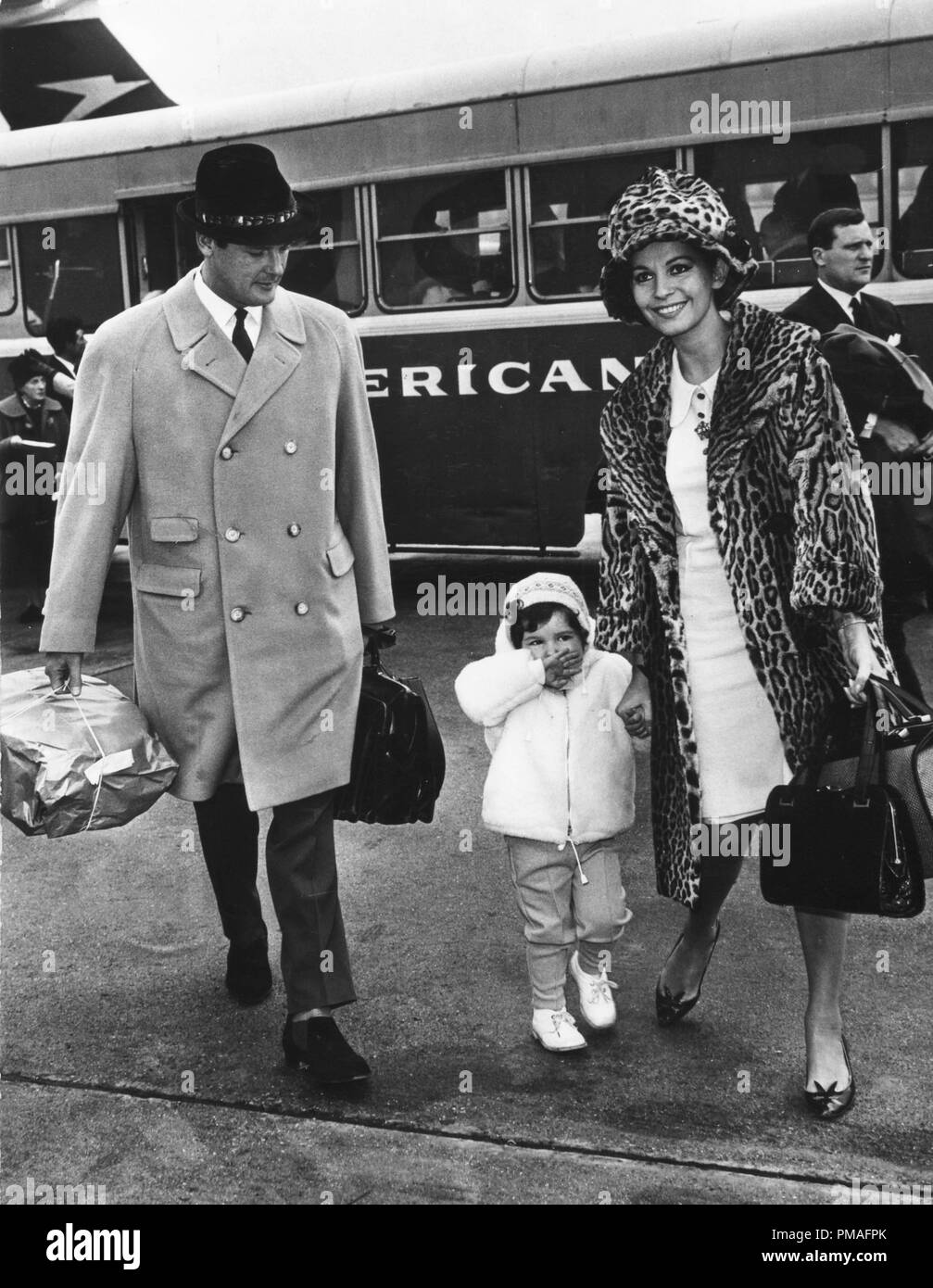 Roger Moore with his wife Luisa Mattioli and their child at London Airport,  circa 1967. © JRC /The Hollywood Archive - All Rights Reserved File  Reference # 32633 754THA Stock Photo - Alamy